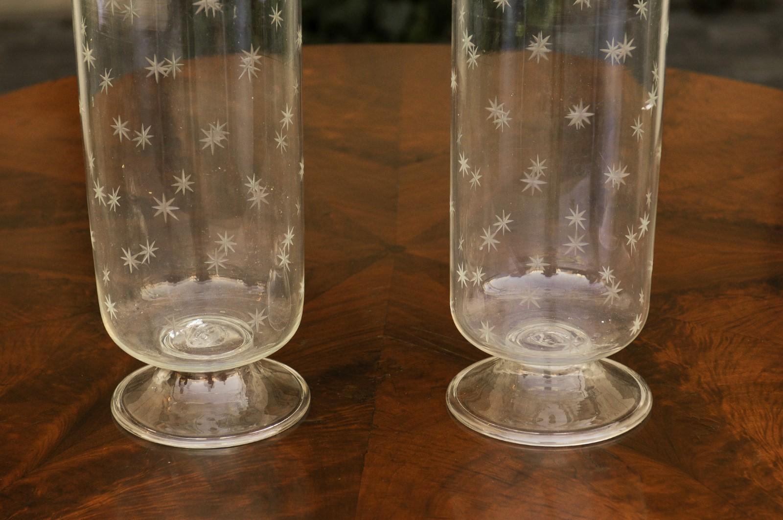 Glass Pair of English 1900s Edwardian Period Tall Lidded Jars with Petite Star Motifs For Sale