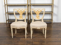 Pair of English 1900s Neoclassical Style Painted and Gilt Chairs with Feathers