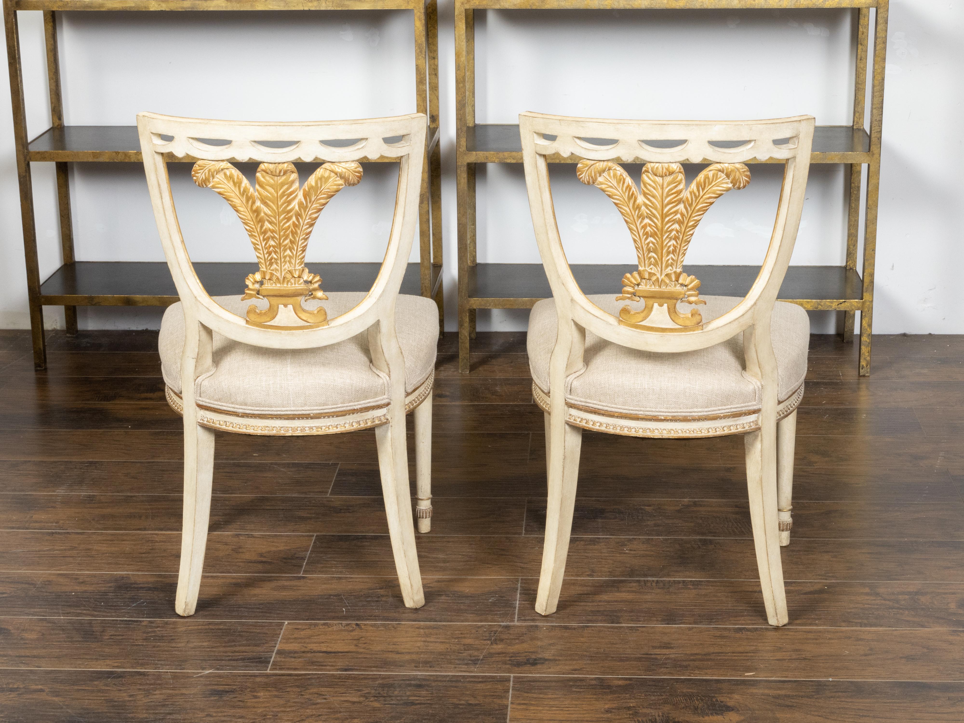 Wood Pair of English 1900s Neoclassical Style Painted and Gilt Chairs with Feathers For Sale