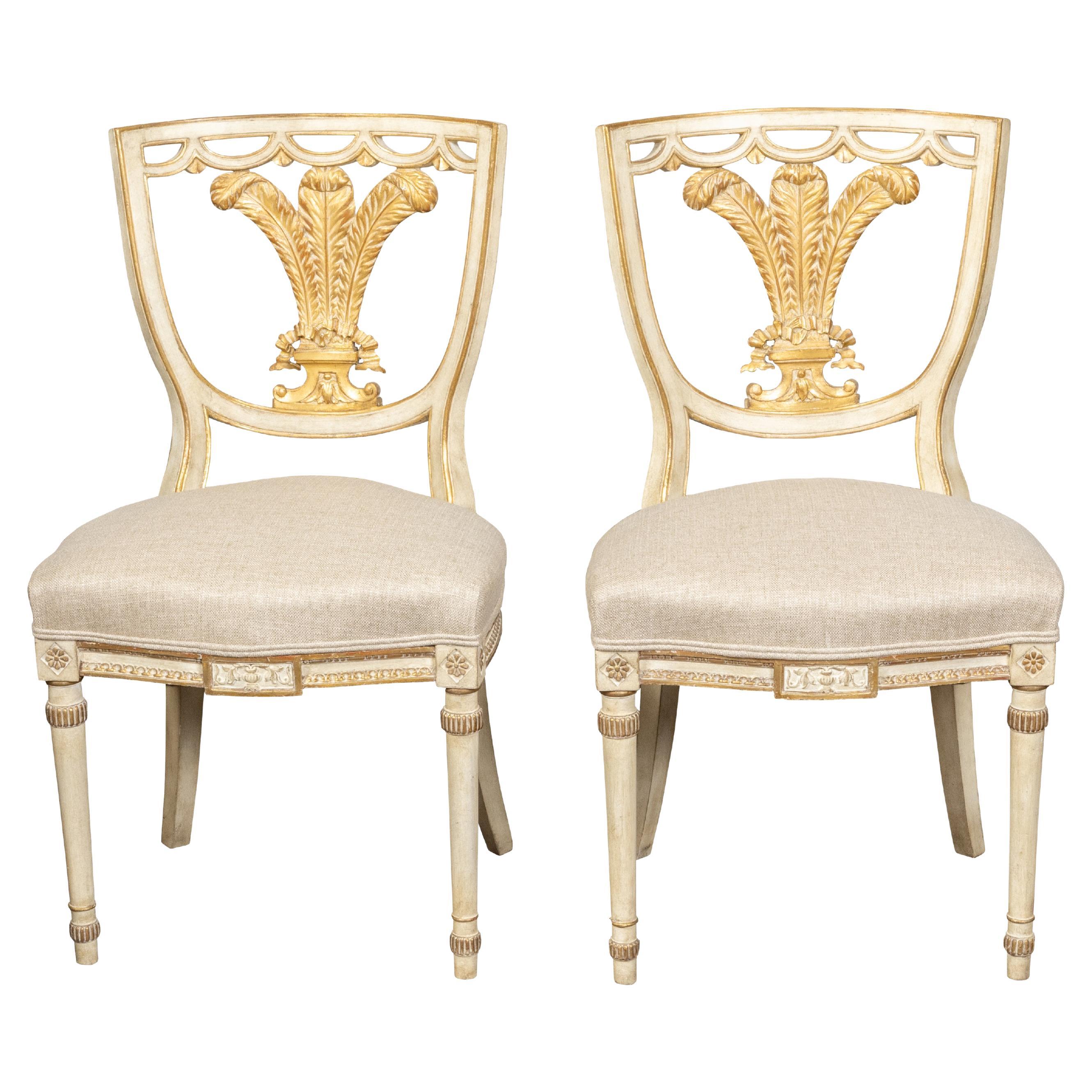 Pair of English 1900s Neoclassical Style Painted and Gilt Chairs with Feathers For Sale