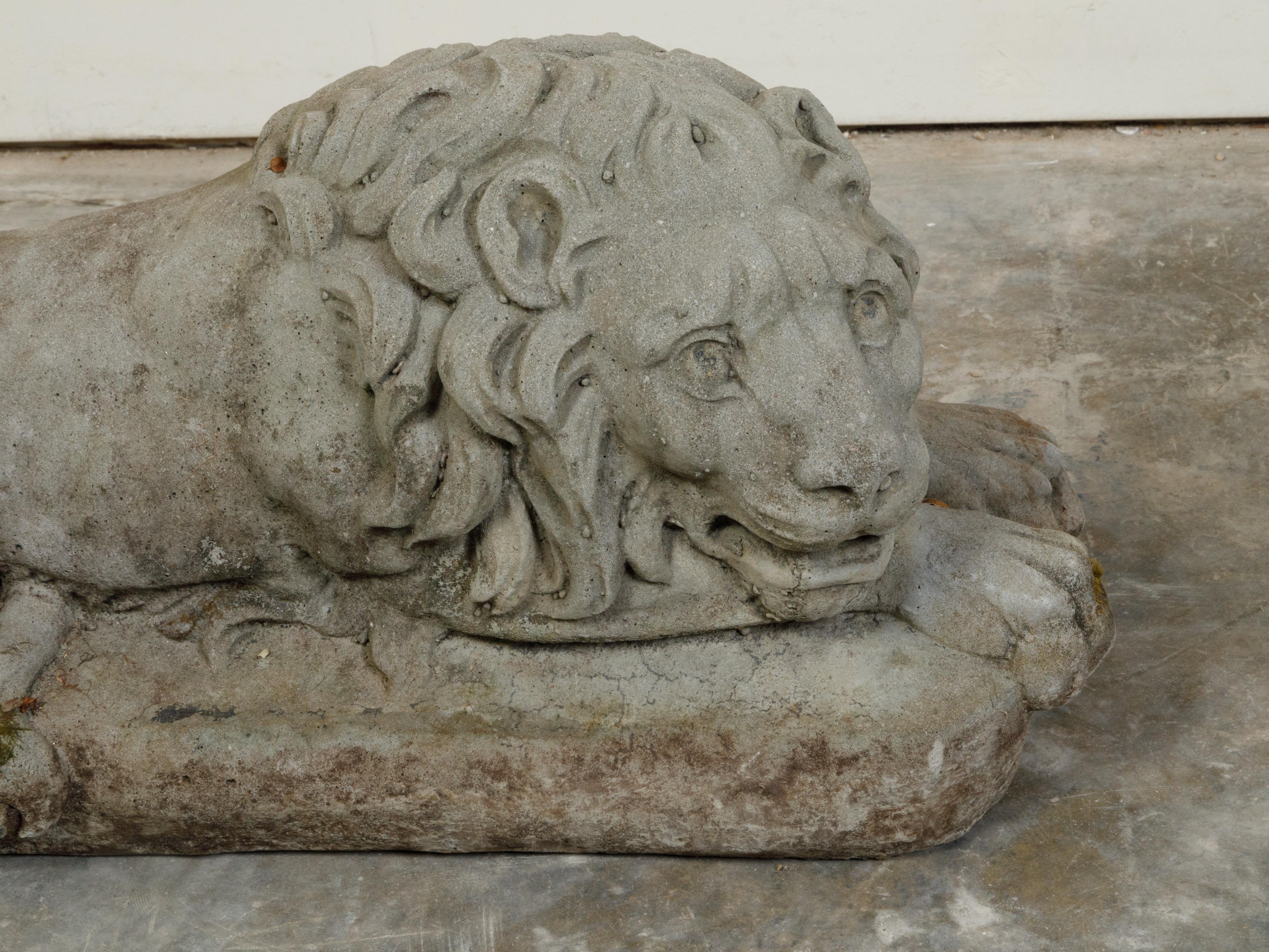 Pair of English 1920s Cast Stone Reclining Lion Sculptures on Conforming Bases For Sale 5