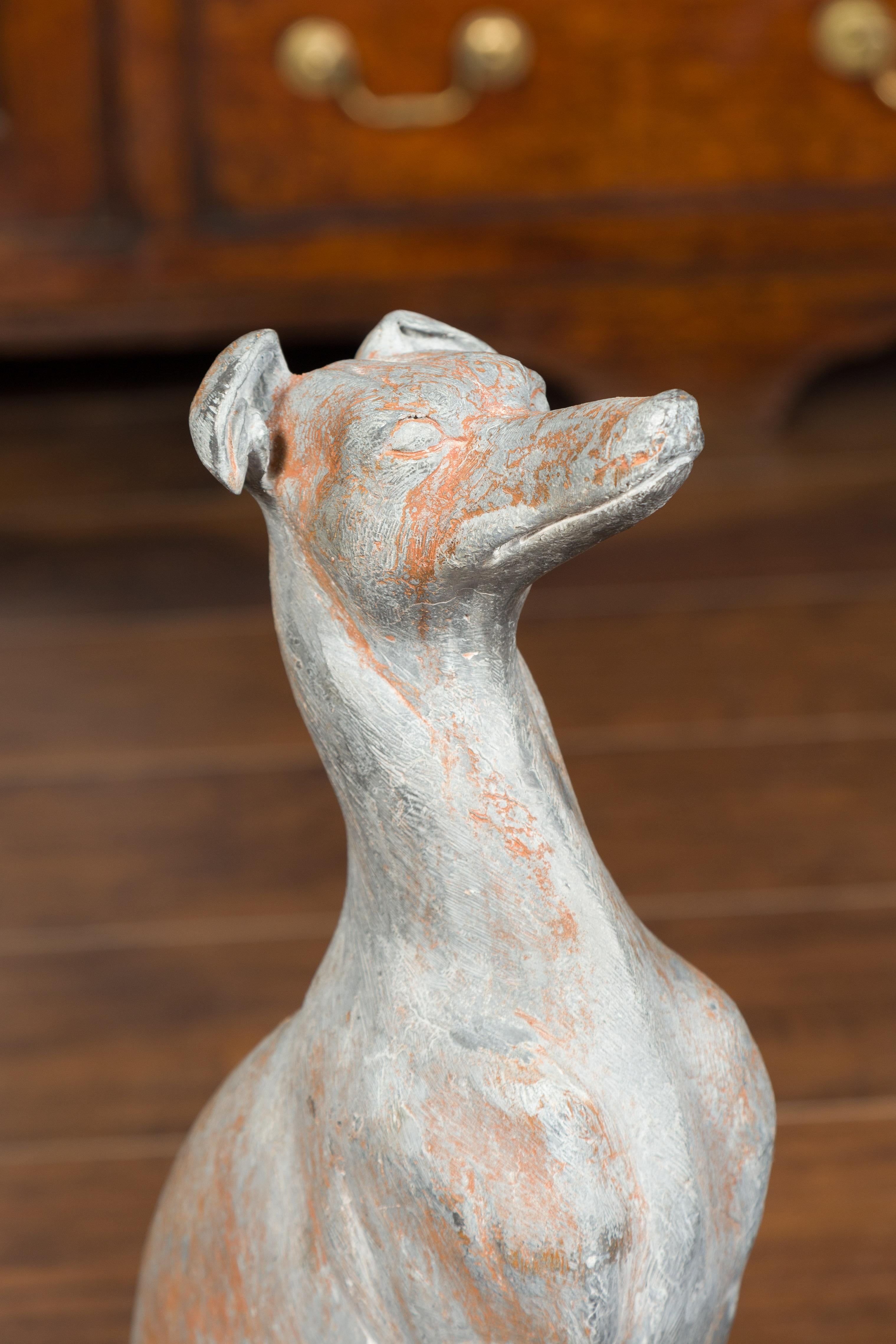 Pair of English 1940s Lead Whippet Dog Sculptures on Scrolling Cartouches 1