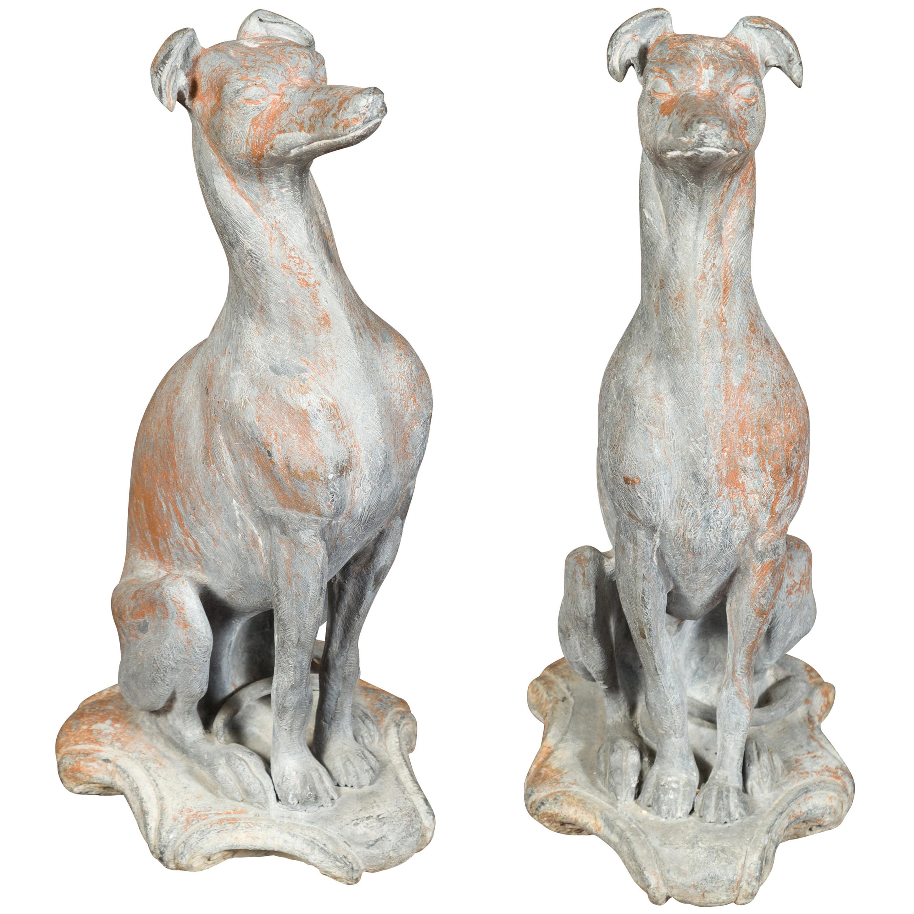 Pair of English 1940s Lead Whippet Dog Sculptures on Scrolling Cartouches
