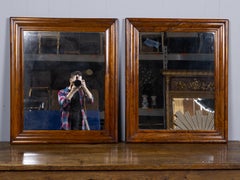 Pair of English 19th Century Figured Walnut Mirrors with Stepped Molded Frames