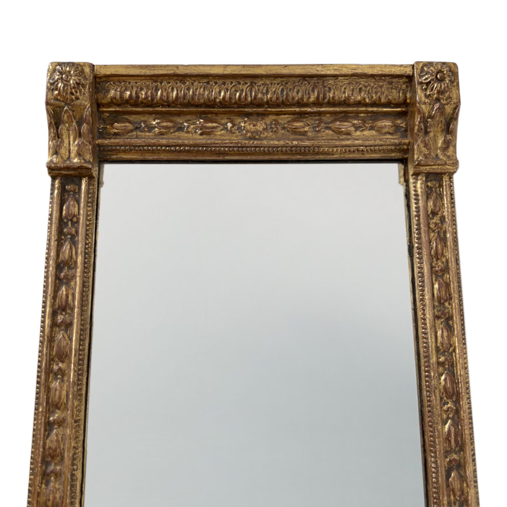 A beautiful pair of English 19th century gilt wood mirrors with carved detail on the frames.

Superb quality and very decorative.

Please note, one mirror is slightly wider than the other - 51cm and 48cm.
