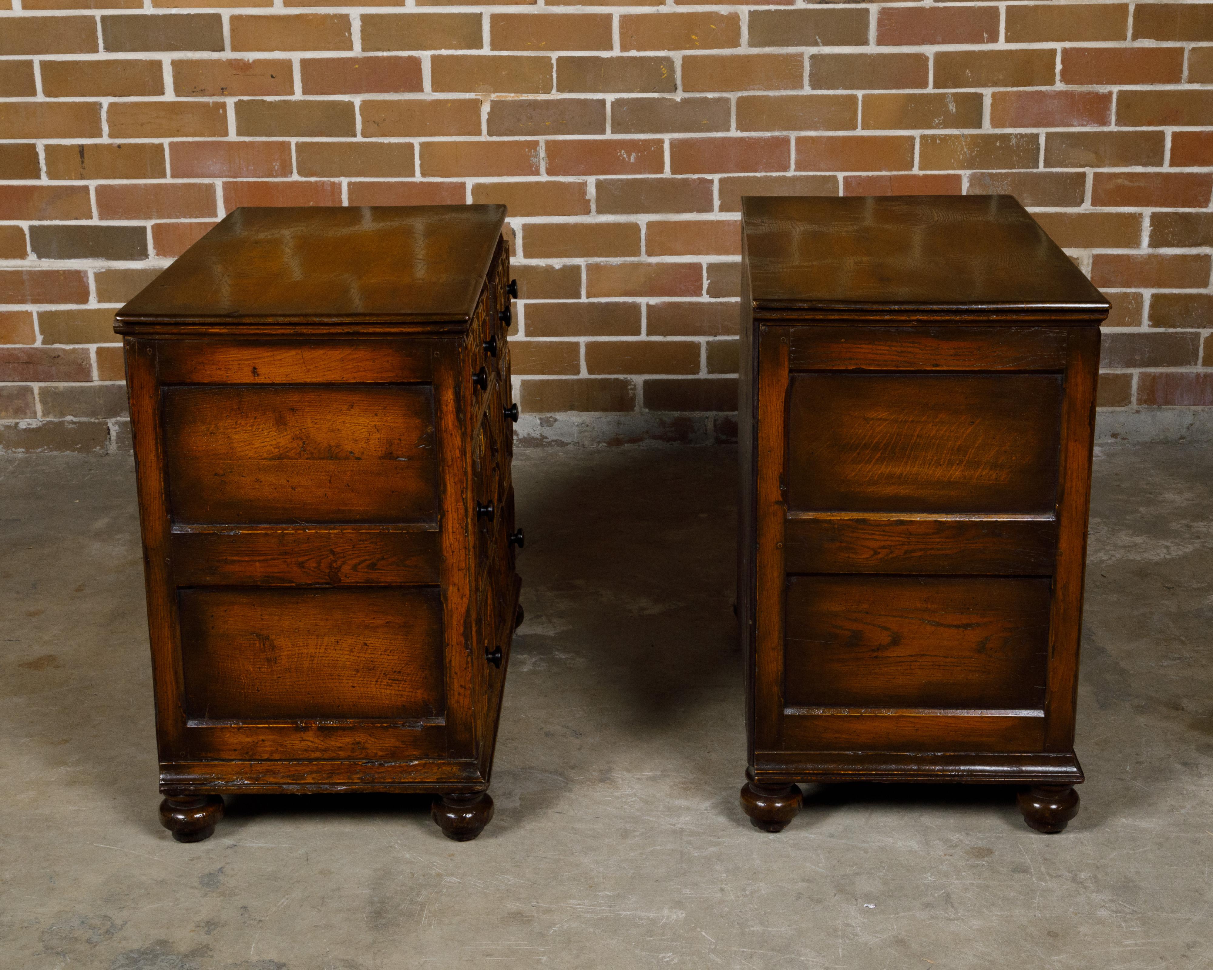 Wood Pair of English 19th Century Oak Geometric Front Four-Drawer Carved Chests For Sale