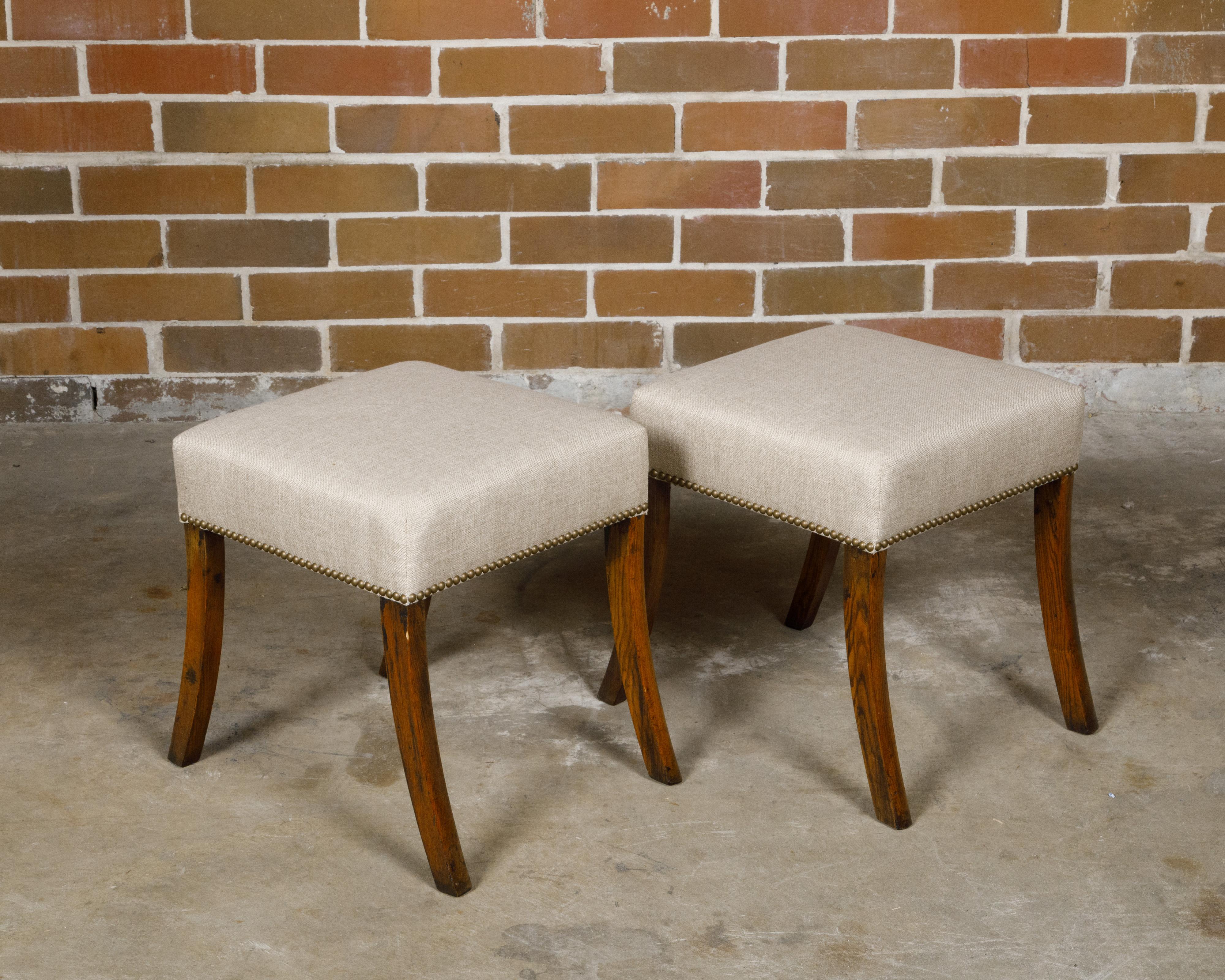 Pair of English 19th Century Oak Stools with Saber Legs and Custom Upholstery For Sale 1
