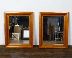 Paire de miroirs muraux anglais en pin du 19ème siècle avec cadres incurvés et biseautés