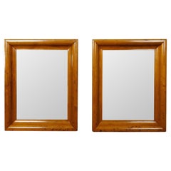 Pair of English 19th Century Pine Wall Mirrors with Beveled Curving Frames