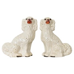 Pareja de Spaniels ingleses de Staffordshire del siglo XIX