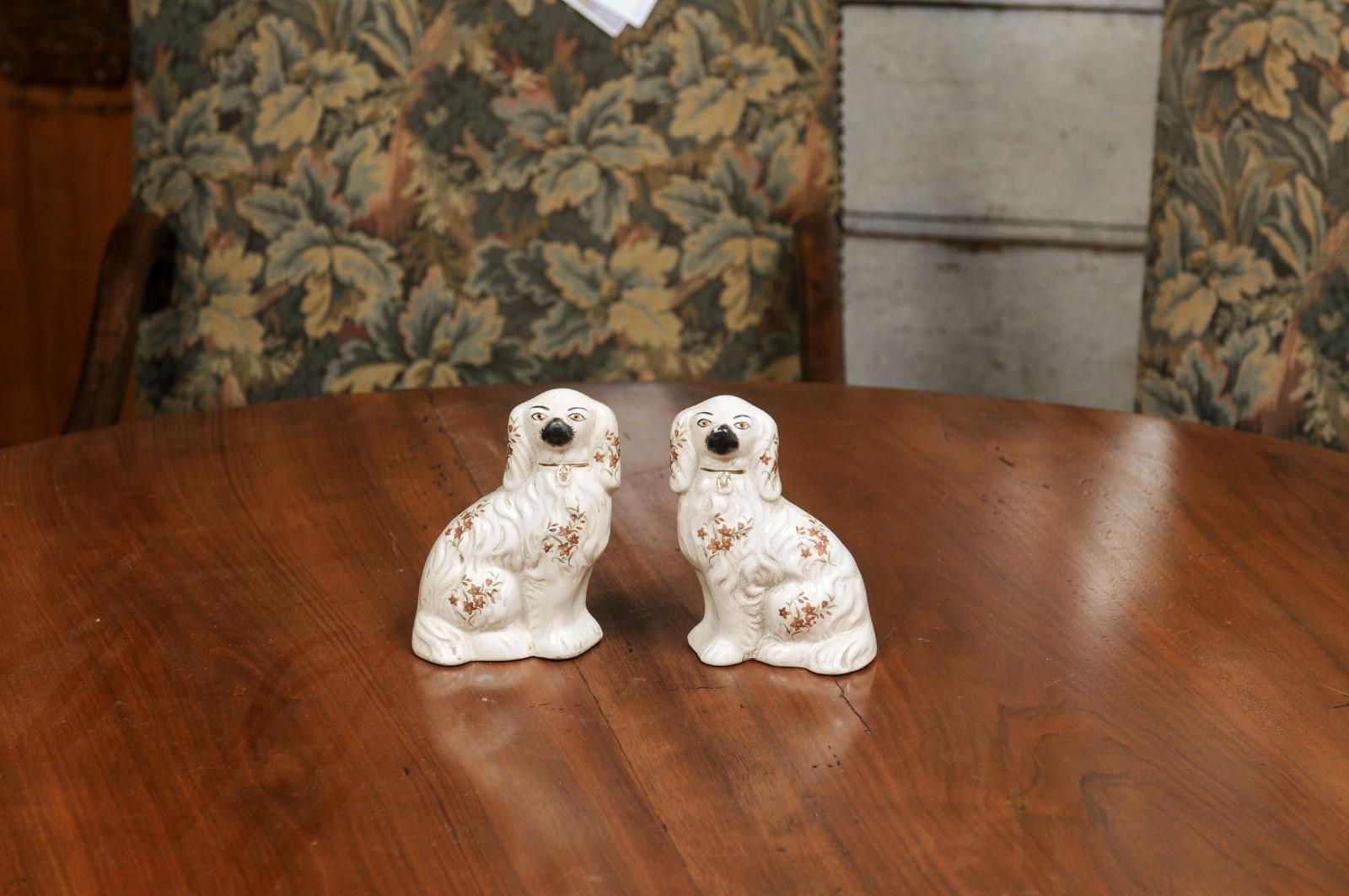Hand-Painted Pair of English 19th Century Staffordshire White Dogs from the Victorian Era