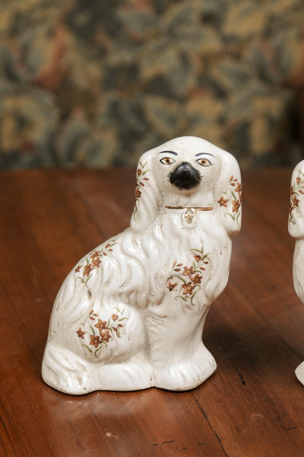 Pottery Pair of English 19th Century Staffordshire White Dogs from the Victorian Era