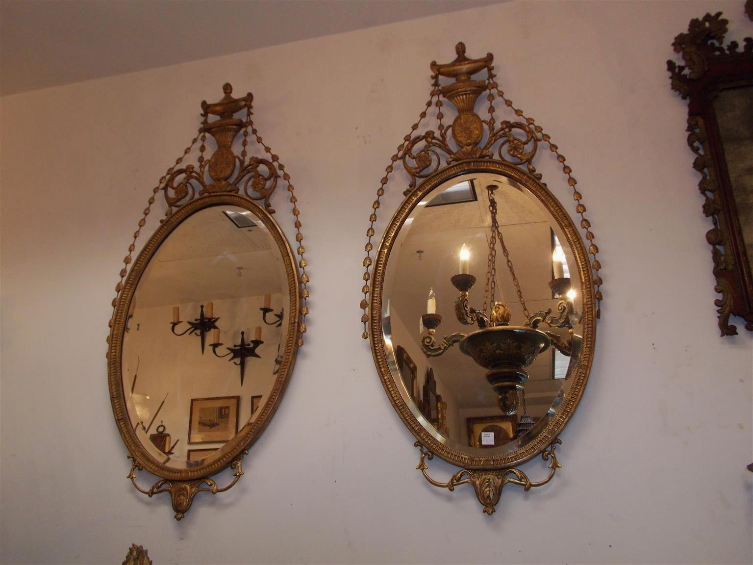 George III Pair of English Adam Oval Urn & Bell Flower Mirrors with Beveled Glass, C. 1800 For Sale