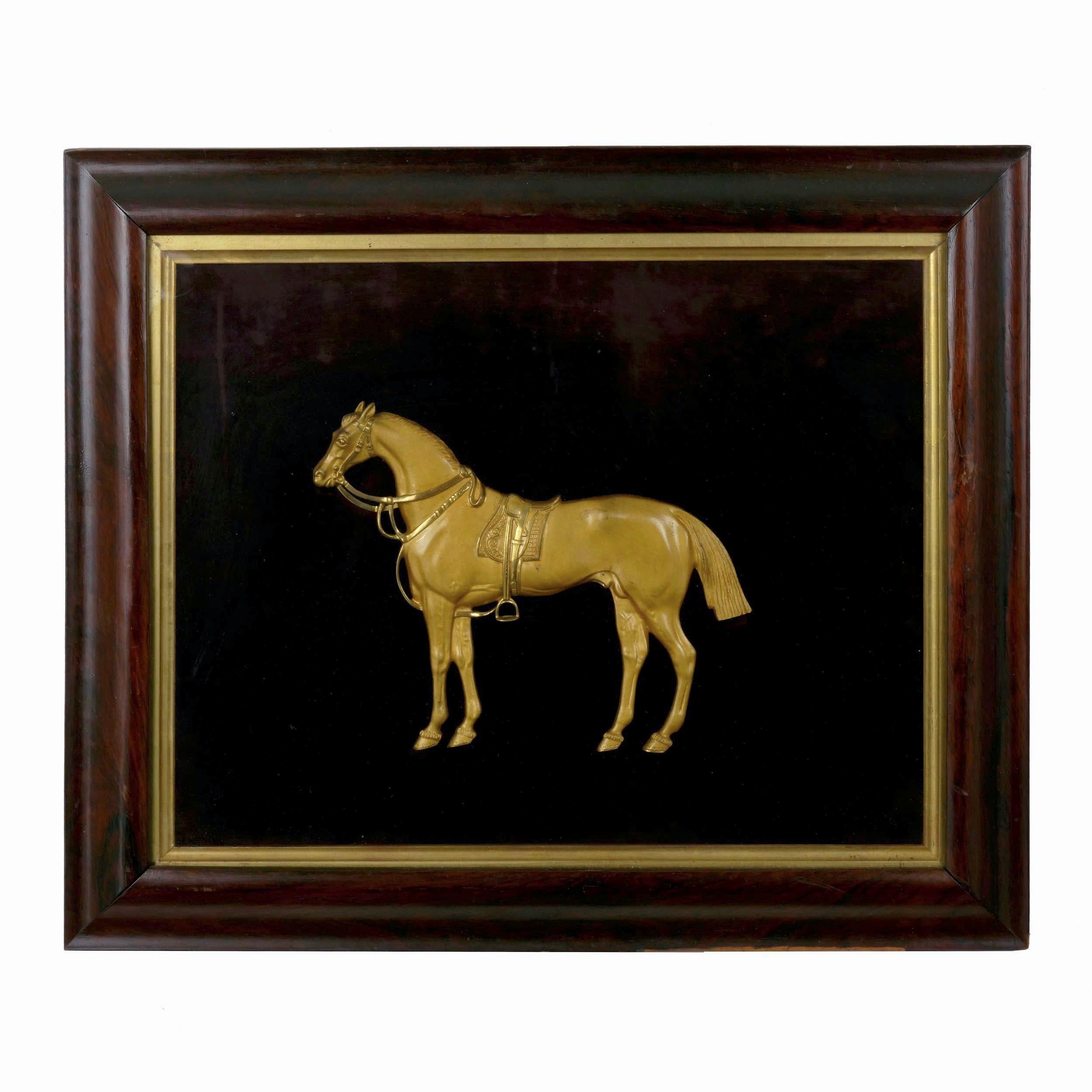 This very fine pair of 19th century equestrian gilt plaques depict an opposing pair of horses with an early Romantic stylizing, both cast in bronze and gilded with a dusty matte gold against burnished highlights. Both are of the finest quality in