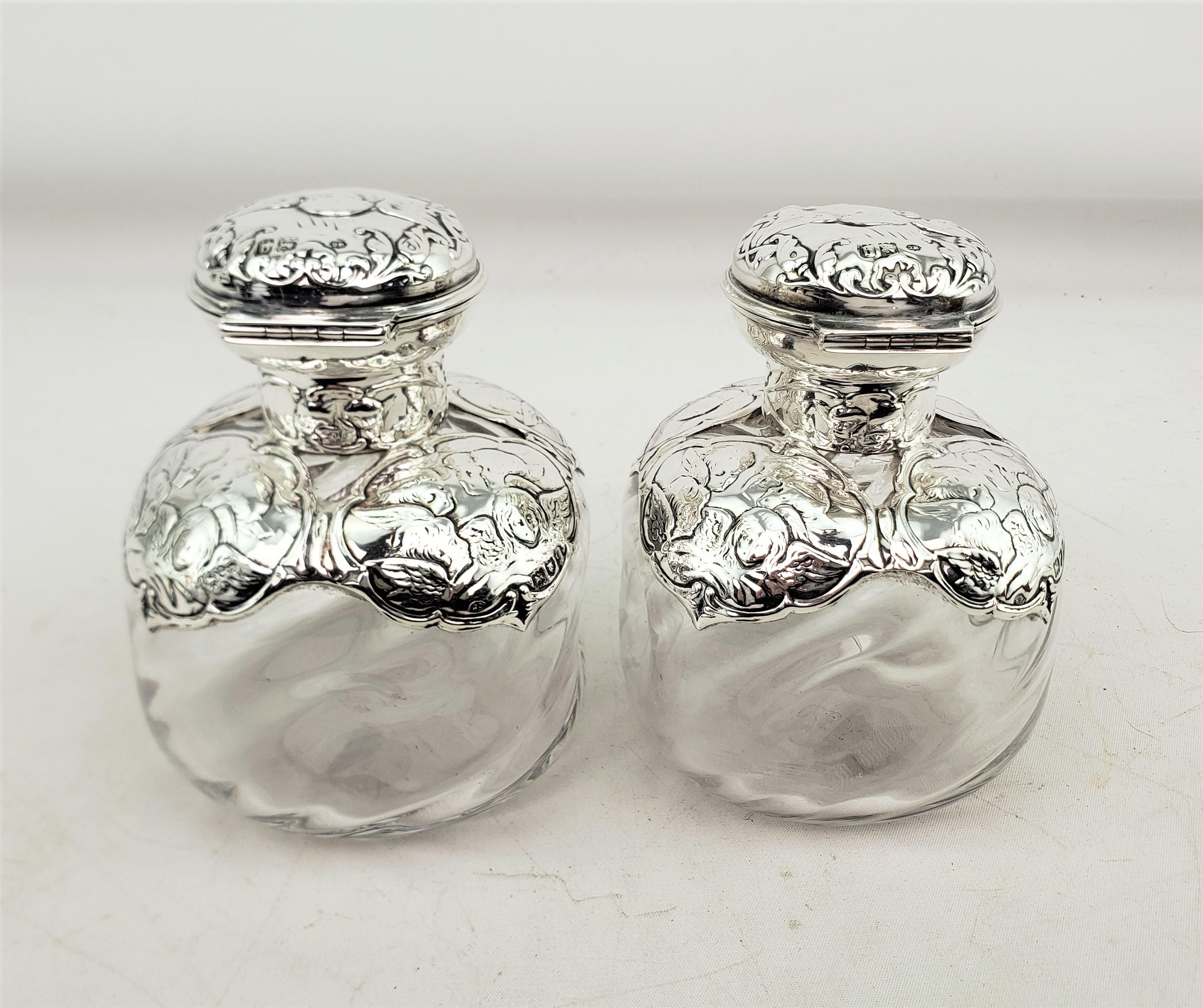 Pair of English Antique Perfume Bottles with Sterling Silver Repousse Angels In Good Condition For Sale In Hamilton, Ontario