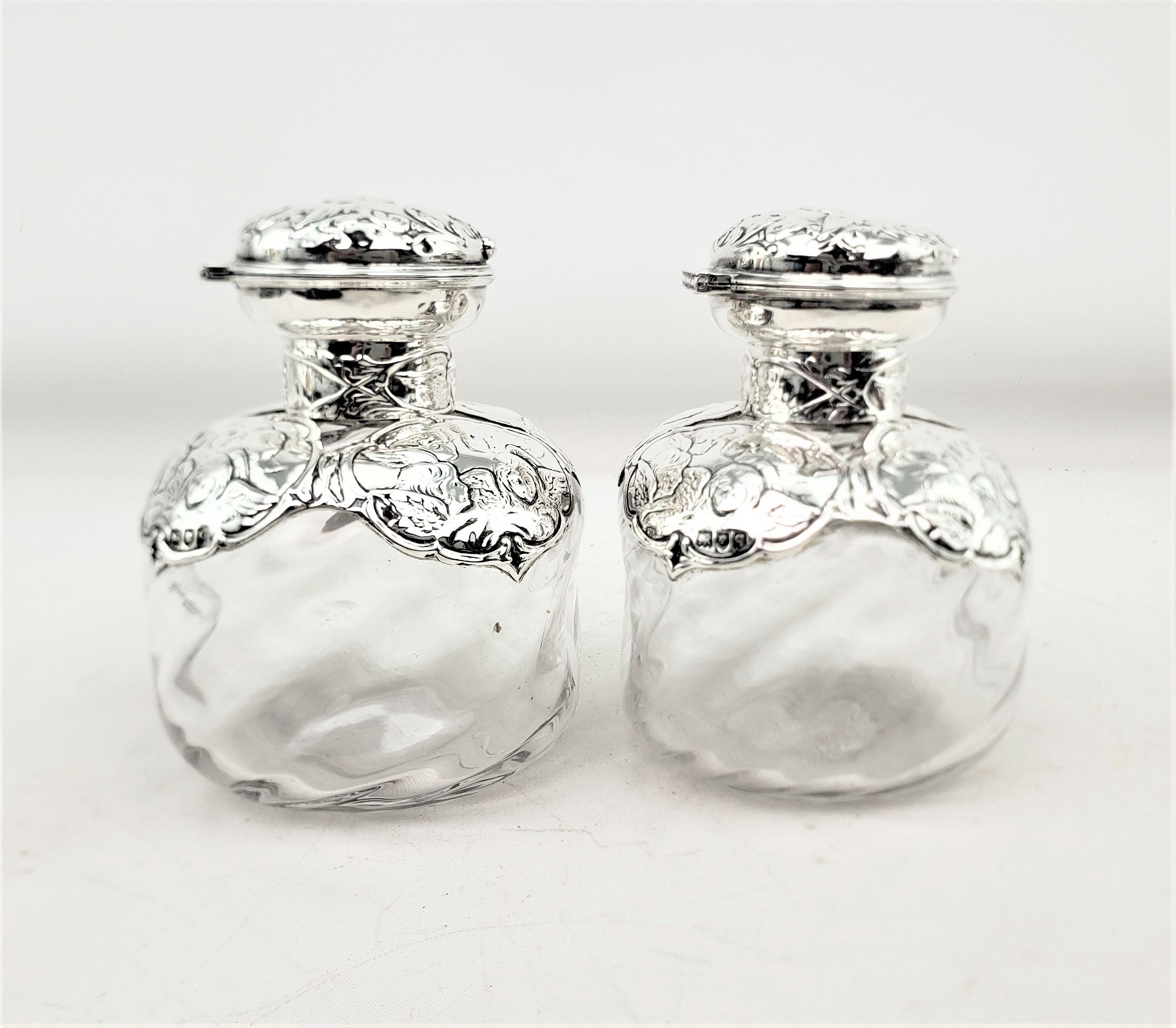 Pair of English Antique Perfume Bottles with Sterling Silver Repousse Angels For Sale 2