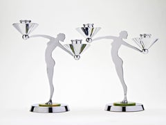Pair of English Art Deco Chrome and Bakelite Nude Figural Double Candleholders