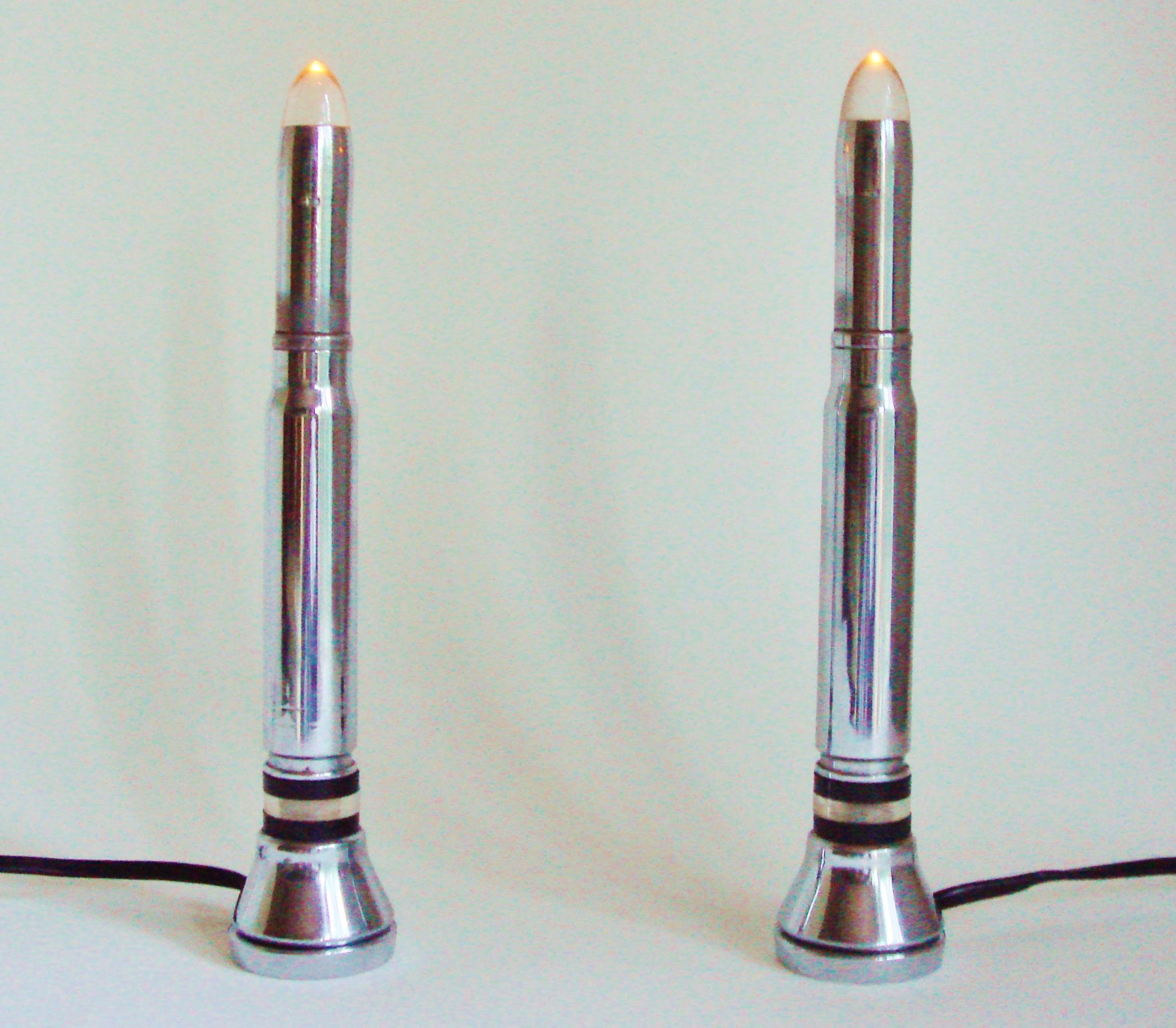 These beautifully designed English Art Deco faux-candle lamps are actually Trench Art pieces created from 20 mm aircraft cannon shells. In 1941 the English Royal Air Force equipped their Spitfire and Hurricane aircraft with 20mm Hispano-Suiza