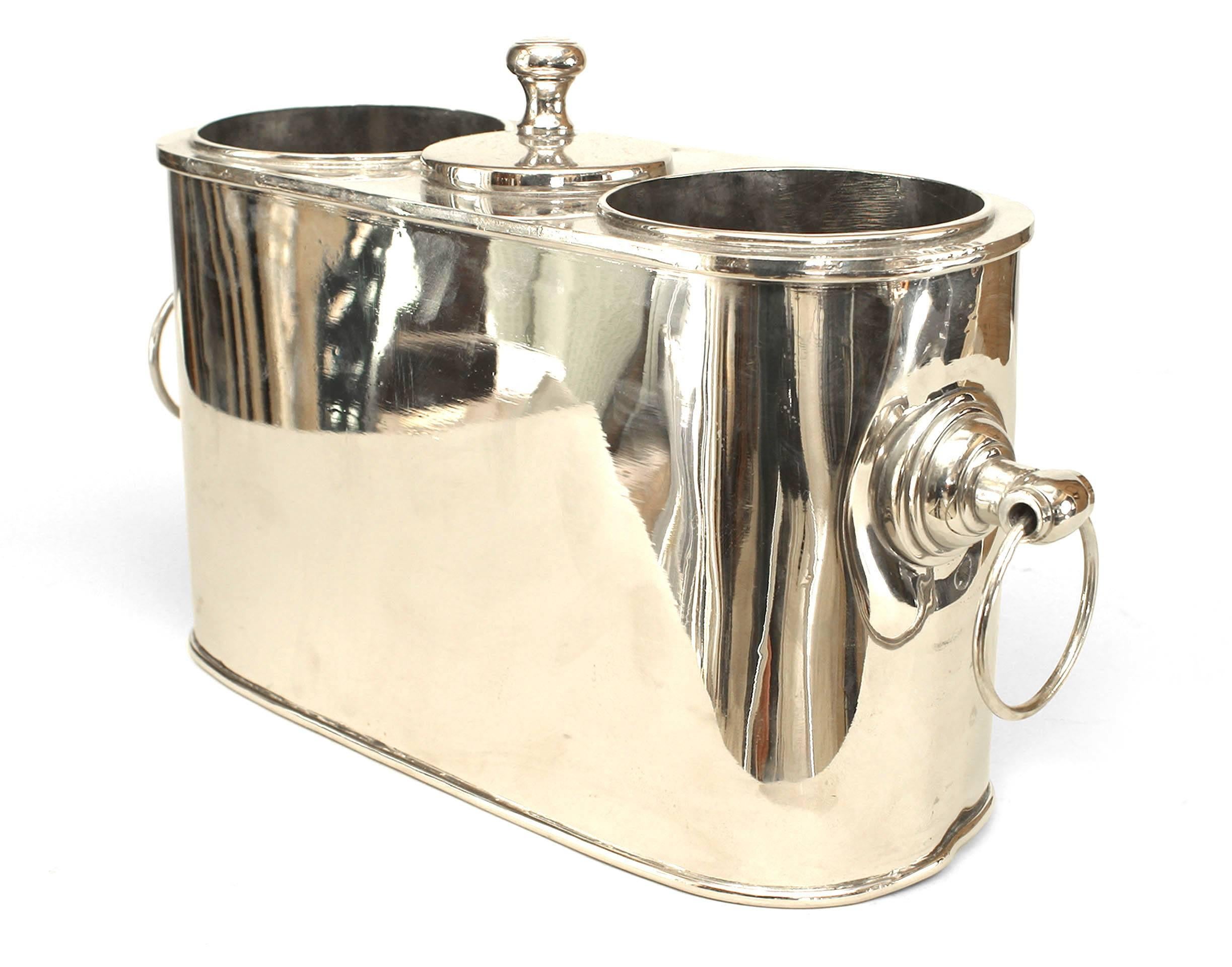 Pair of English Art Moderne style nickel-plate oval wine coolers with a Pair of wells centering an opening with a cover flanked by side ring handles. (PRICED AS Pair)
