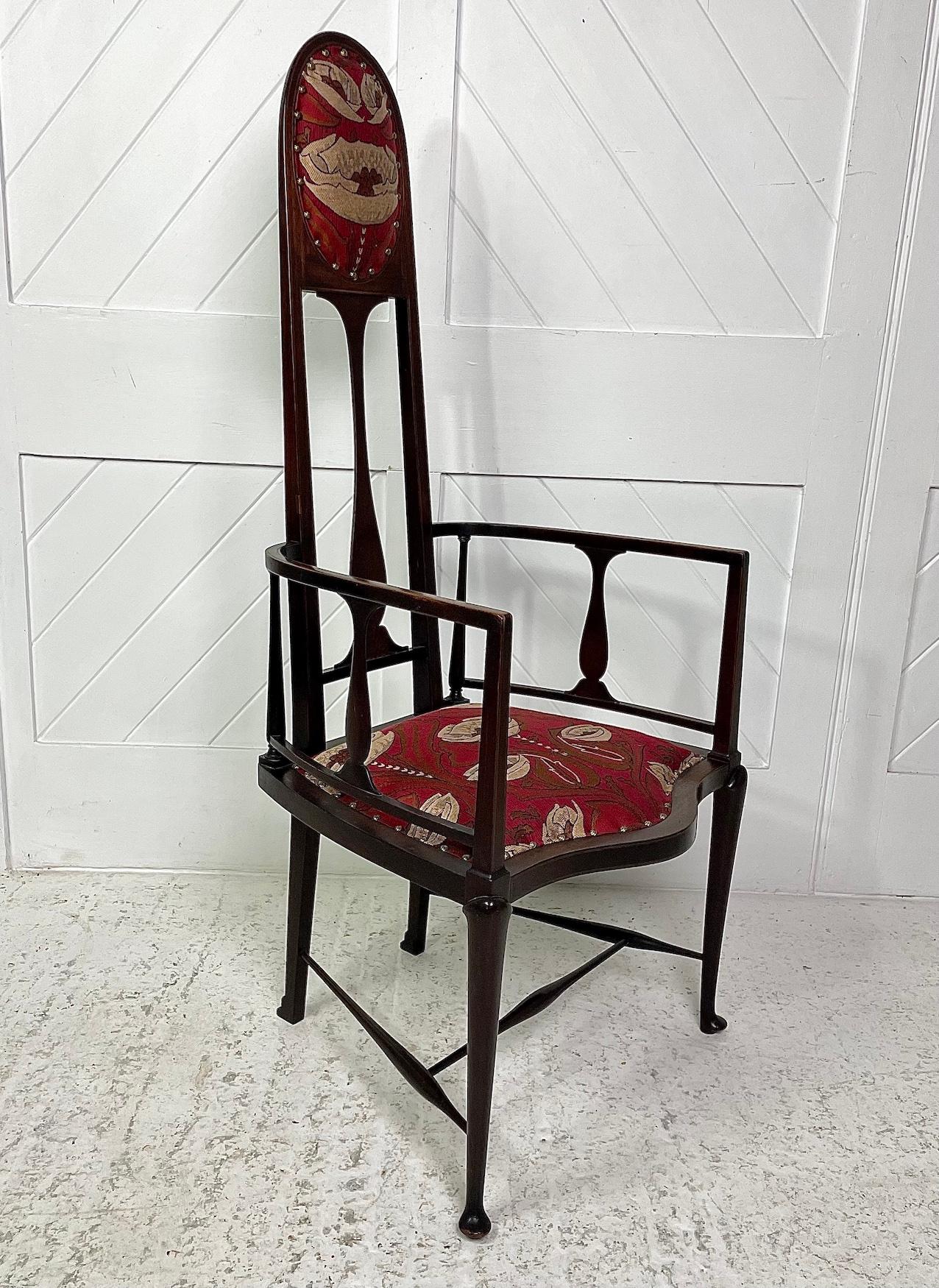 A pair of English Art Nouveau side chairs
In mahogany with inlaid stringing
They have been re-upholstered in fabric by Watts of Westminster
Designed by G M Ellwood for J S Henry