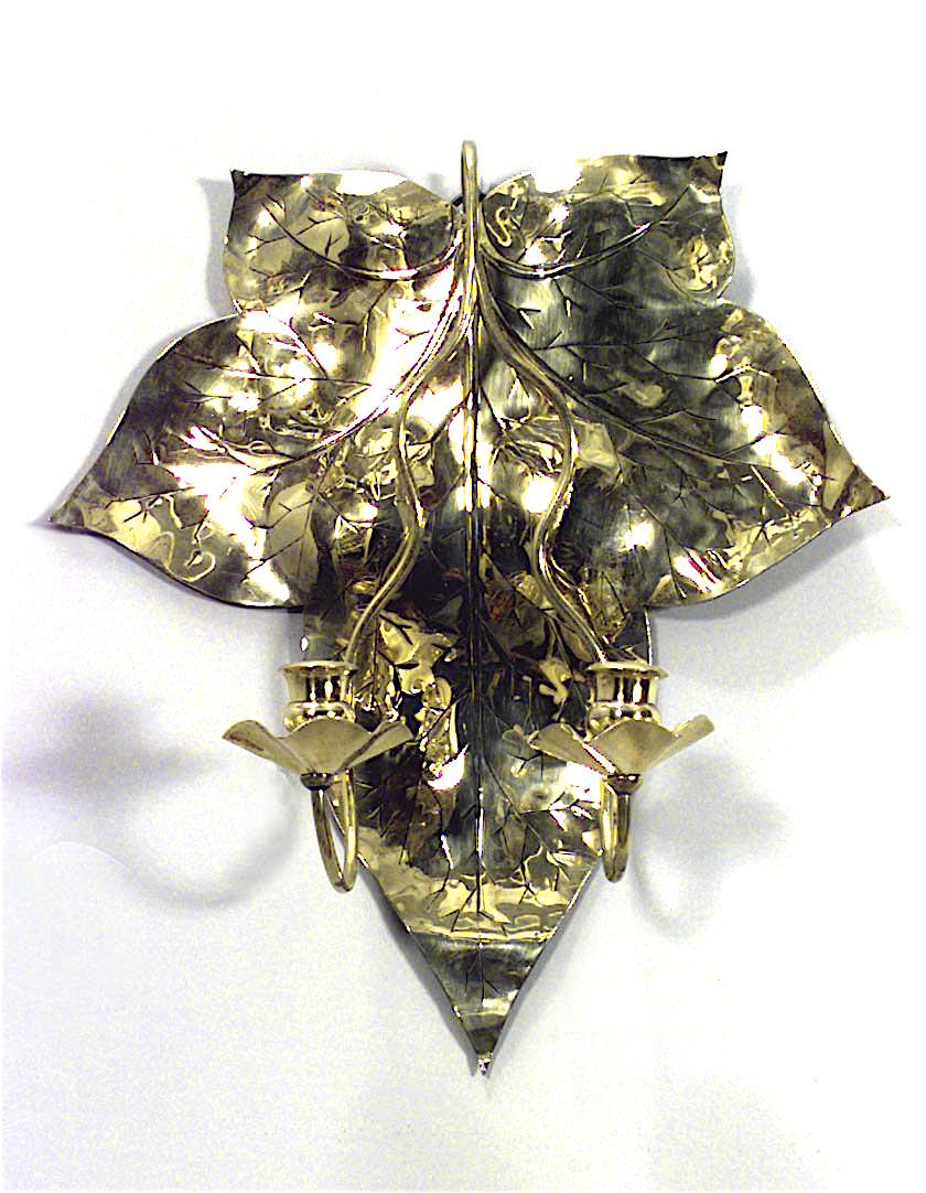 Pair of English Arts and Crafts brass wall sconces with two arms and leaf design (PRICED AS Pair)
