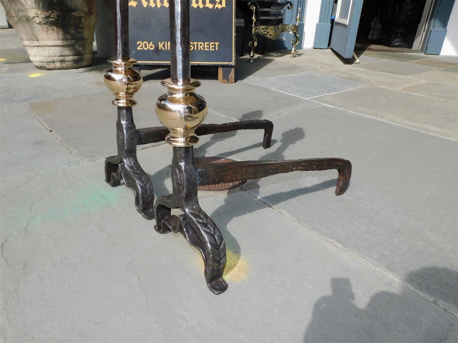 Late 18th Century Pair of English Brass and Polished Steel Urn Finial Fire Place Andirons, C. 1780 For Sale