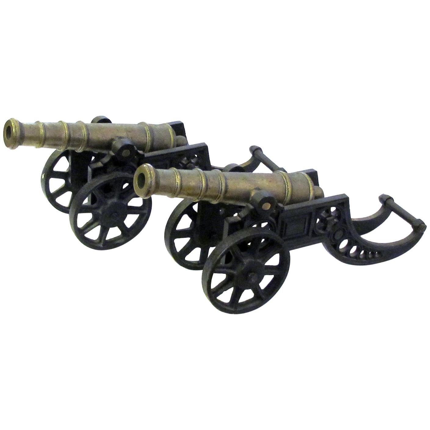Pair of English Brass Ornamental Signal Cannons on Cast Iron Carriages