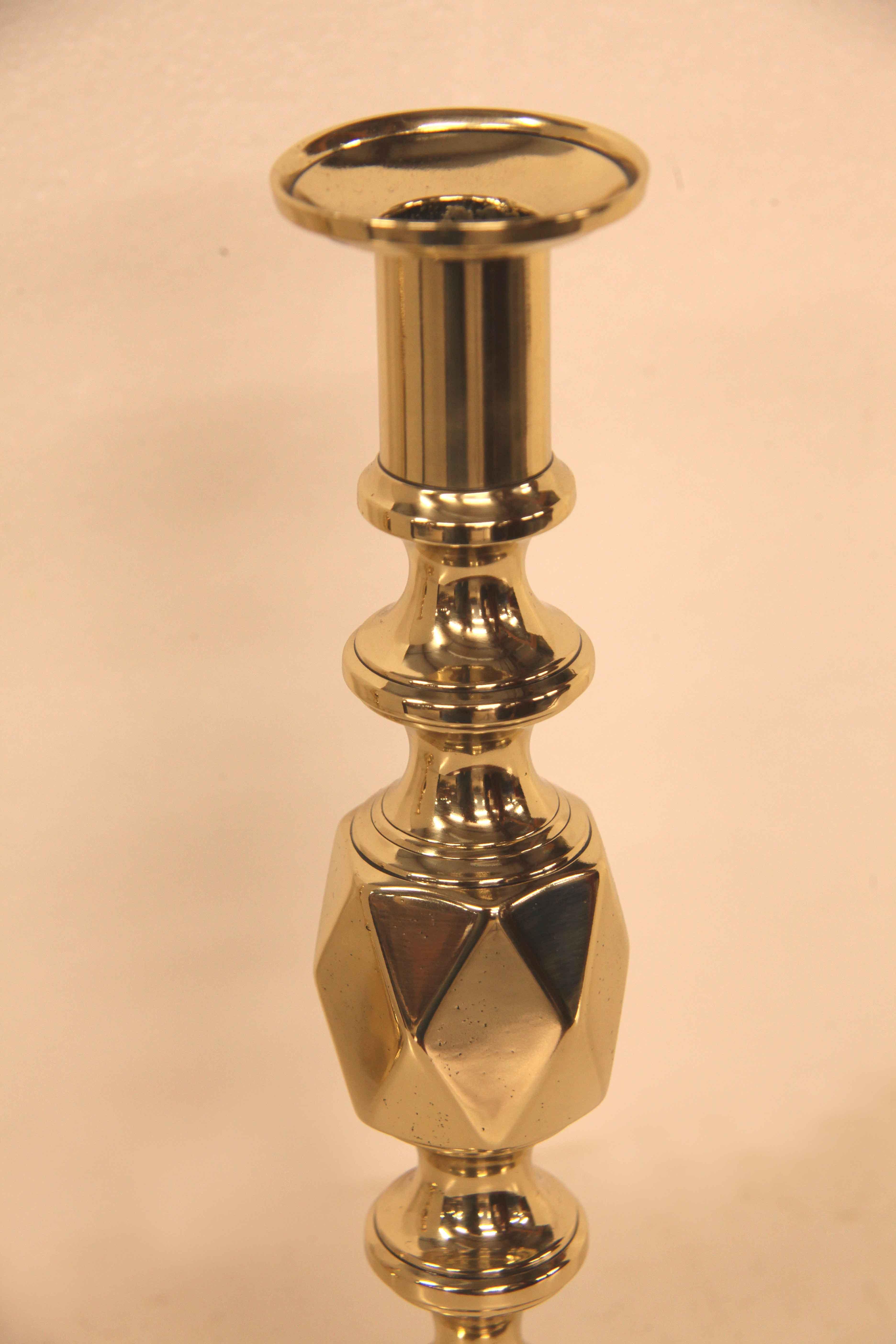 Pair of English brass ''Queen of Diamonds'' candlesticks, this pair are from the famous diamond candlestick series that have been collected for generations ( serious collectors hunt for and find the entire series) From smallest to largest they