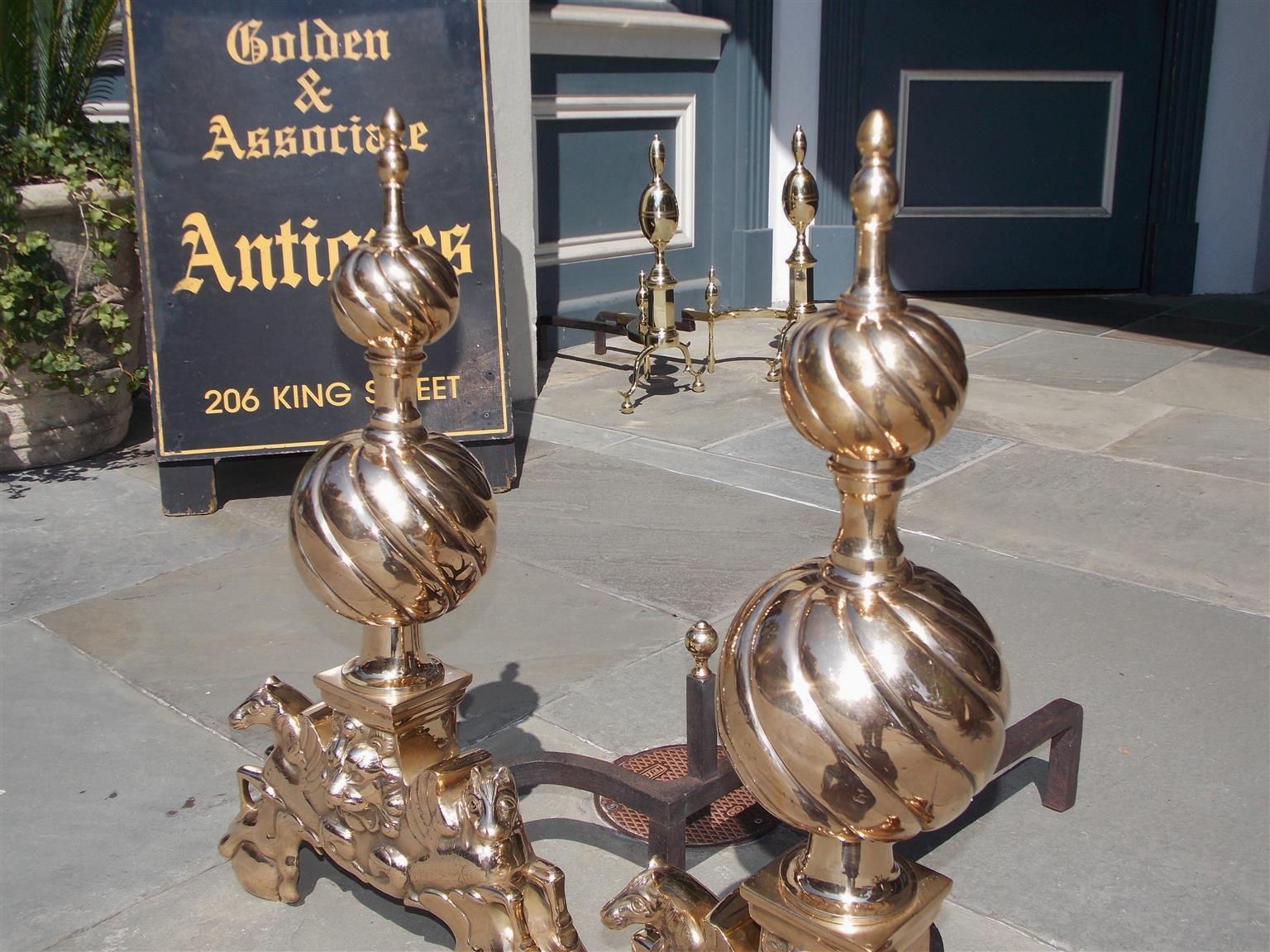 William IV Pair of English Brass Spiral Ball Andirons with Flanking Lion & Pegasus. C. 1840 For Sale
