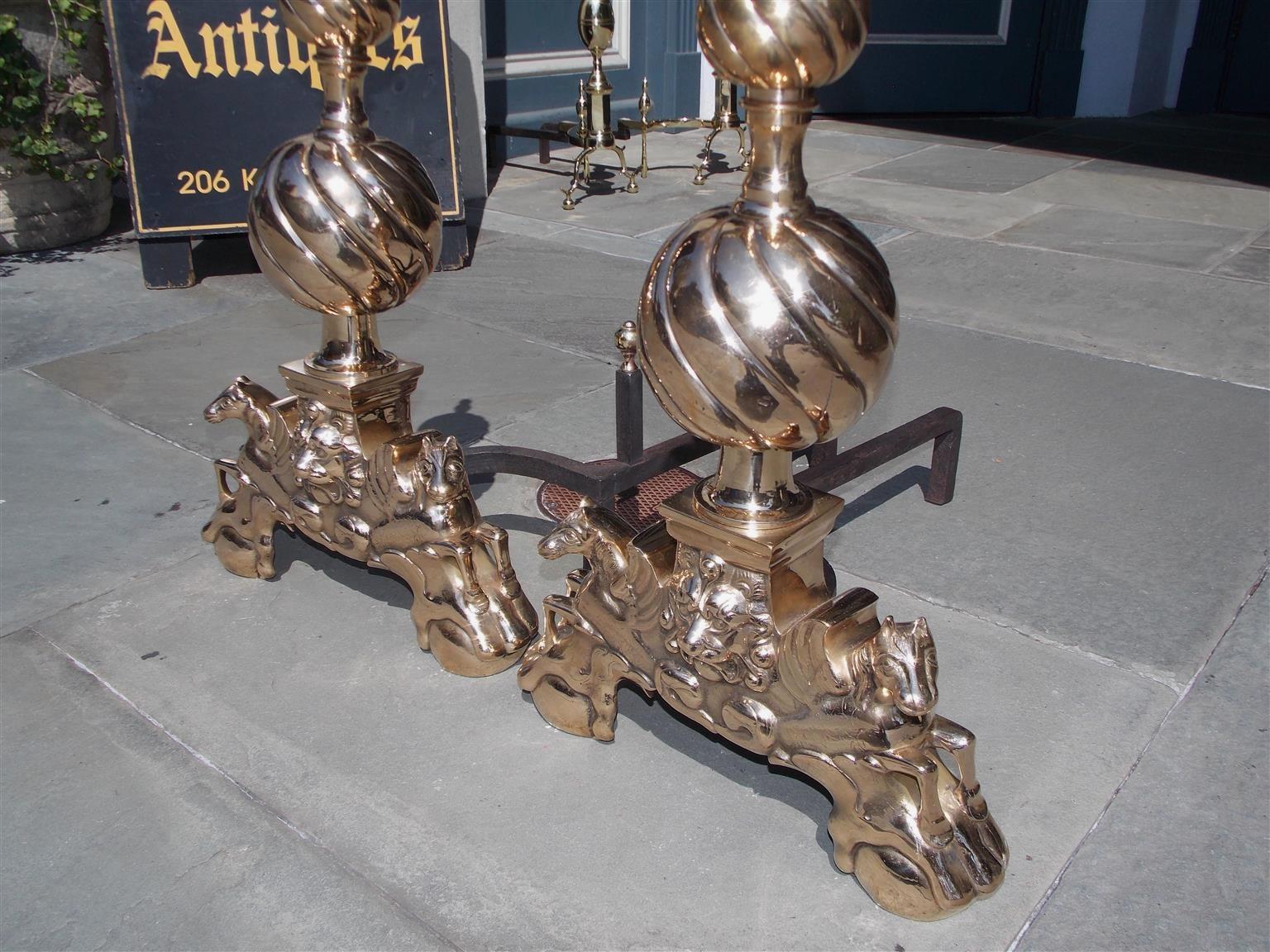 Cast Pair of English Brass Spiral Ball Andirons with Flanking Lion & Pegasus. C. 1840 For Sale