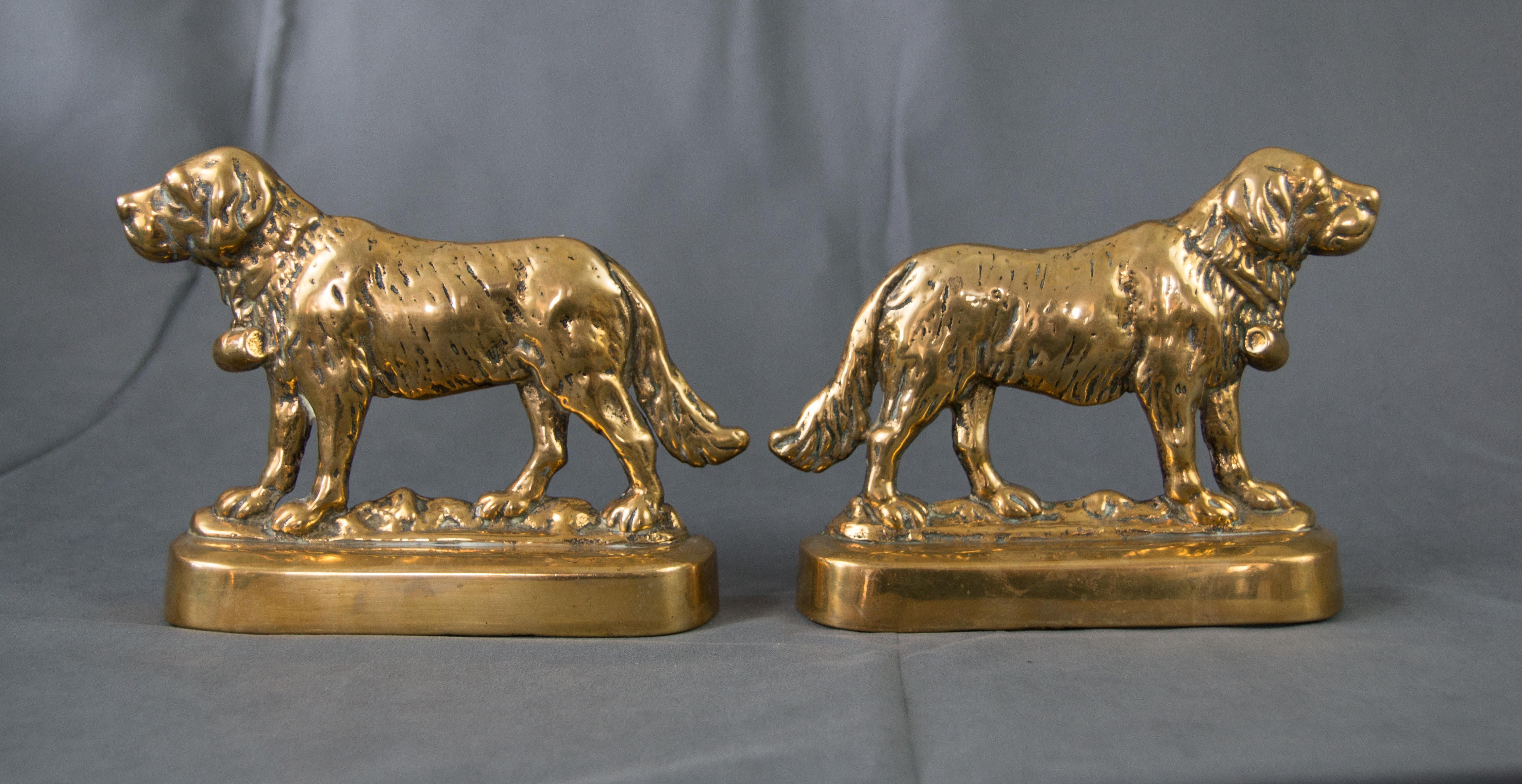 A superb pair of large antique English solid brass St. Bernard dog bookends or mantel decorations, circa 1920. These handsome dogs are finely cast heavy solid brass and would look fabulous displayed on a bookcase or mantel.

Dimensions
9.5