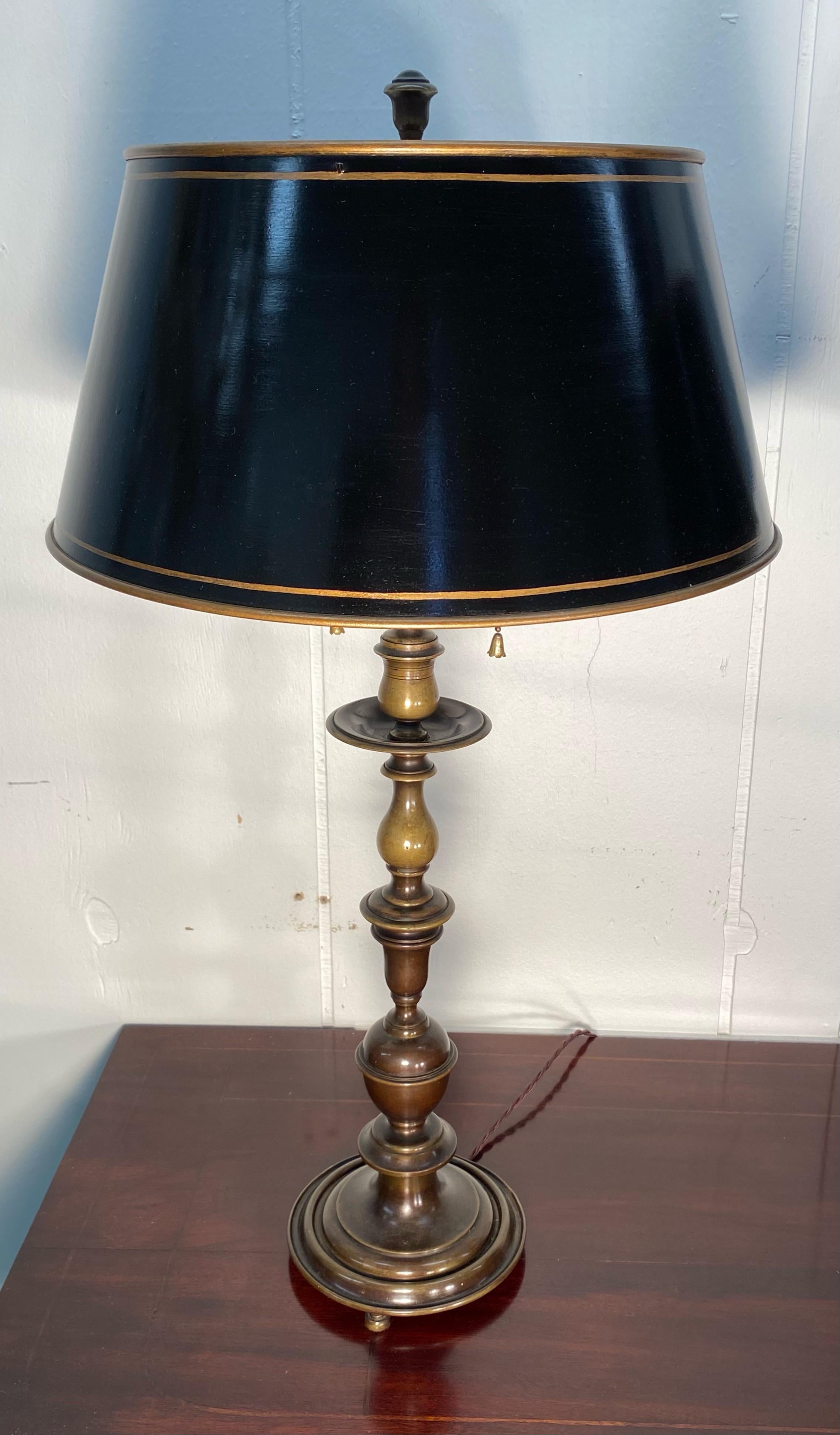 Pair of English Baroque style lamps with Baluster Standard toped with two light Original Clusters, tole shades and finals. These Balustrade lamps have a wonderful patinated finish with elegantly painted tole shades. 
Tole Shade is 14 inches