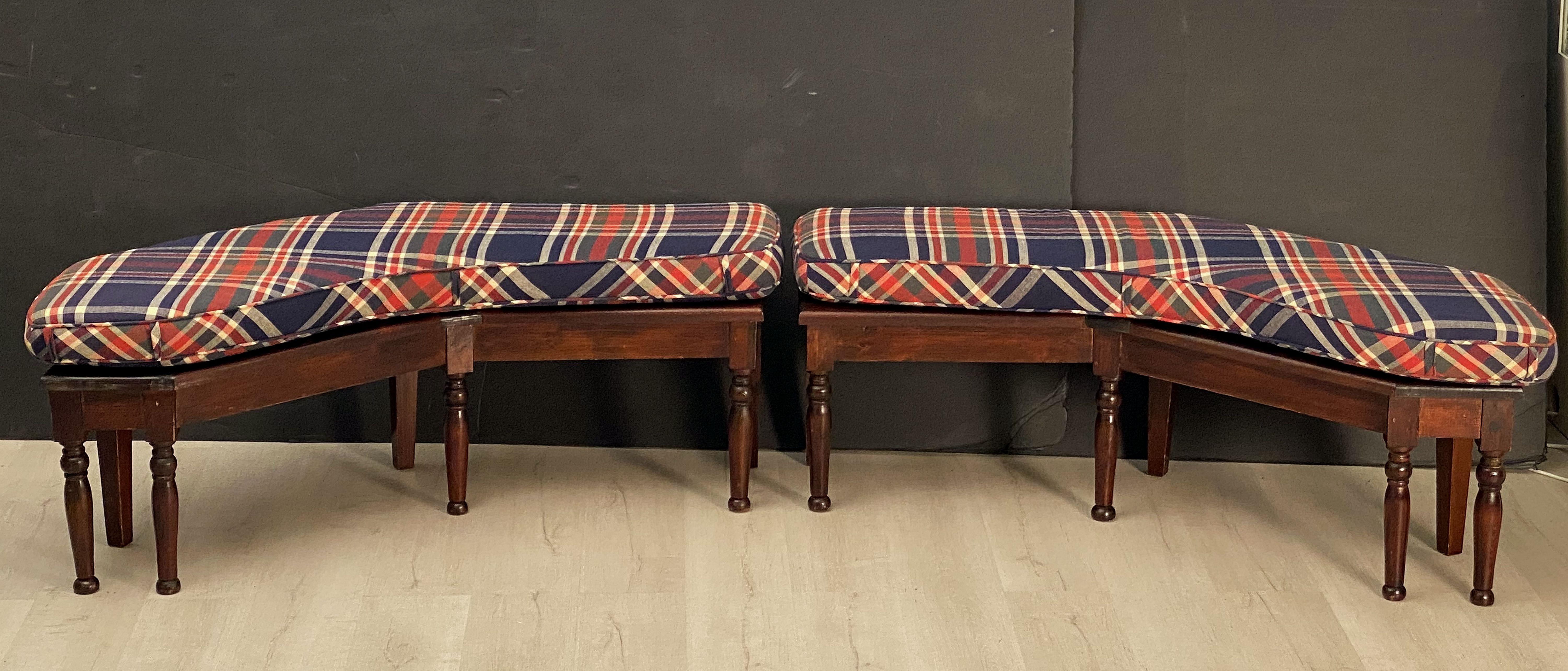 A fine pair of English canted benches or window seats of stained pine with optional cushions upholstered in a plaid or tartan pattern - each bench featuring a canted moulded top with turned leg supports.

Seat Height With Cushion: 19 inches

Seat