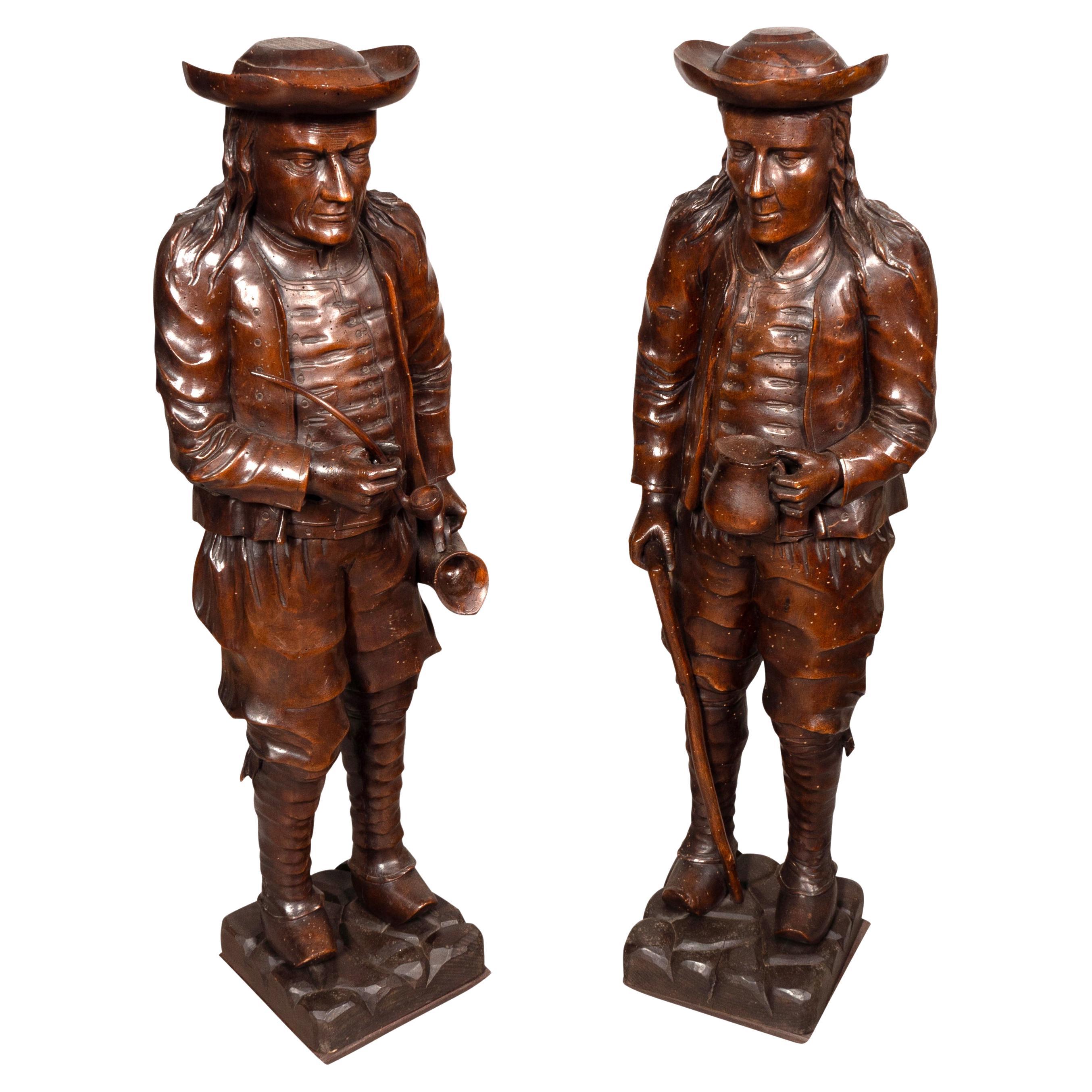 Pair Of English Carved Walnut Figures Of Country Gentleman For Sale