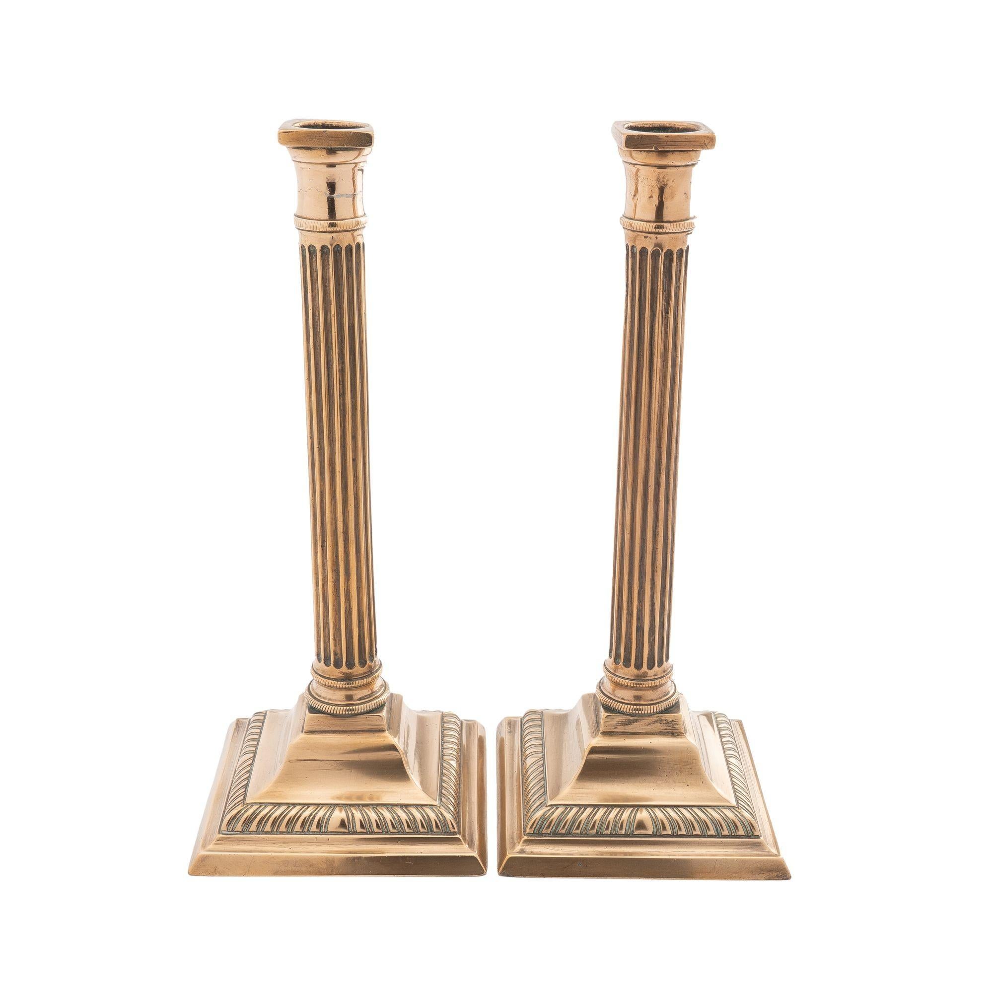 18th Century Pair of English cast brass columnar candlesticks, c. 1790 For Sale