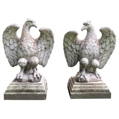 Pair of English Cast Stone Opposing Eagles on Short Plinths