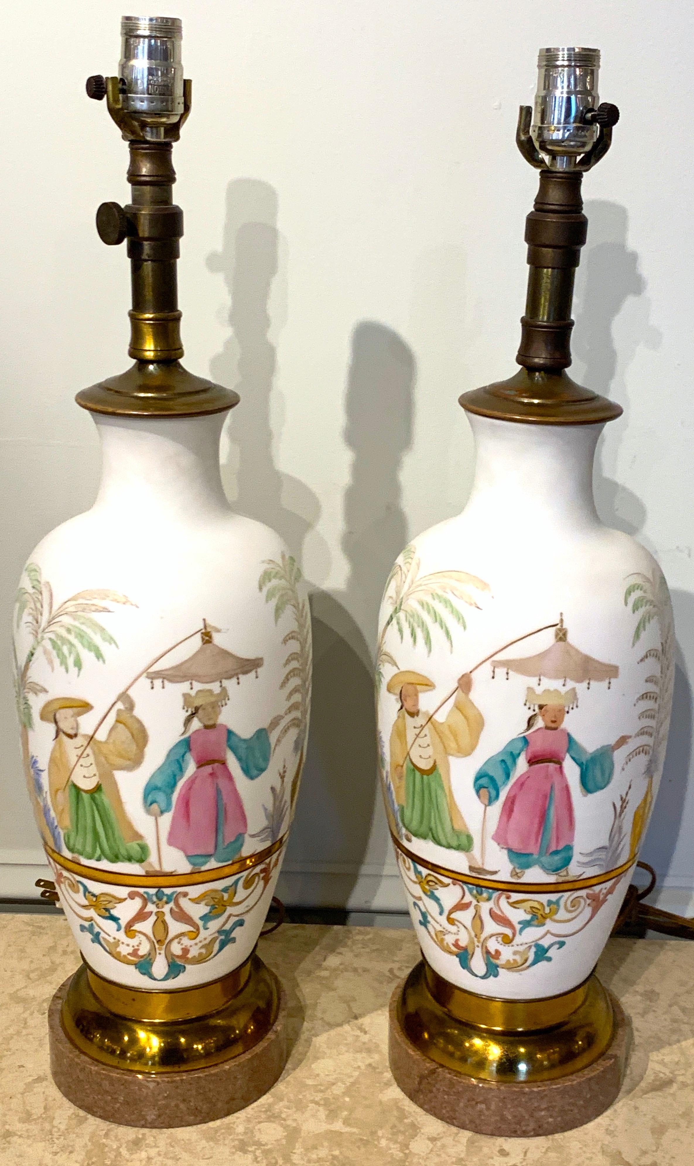 Pair of English chinoiserie  opaline glass vases, now as lamps, each one decorated with gilt and colorful enamel, raised on 6