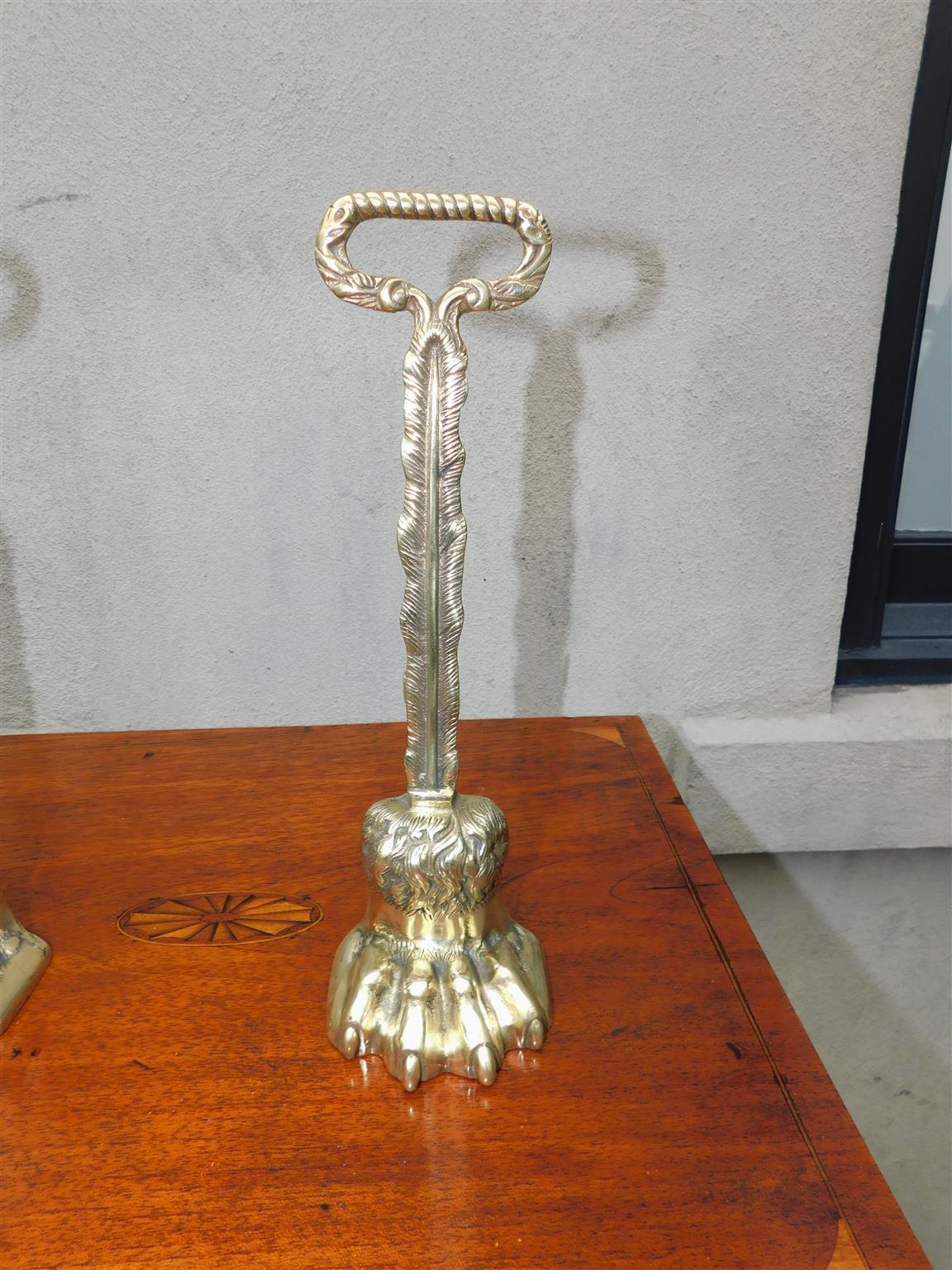 Pair of English Chippendale Brass Lion Paw Doorstops with Oval Handles, C. 1780 For Sale 2