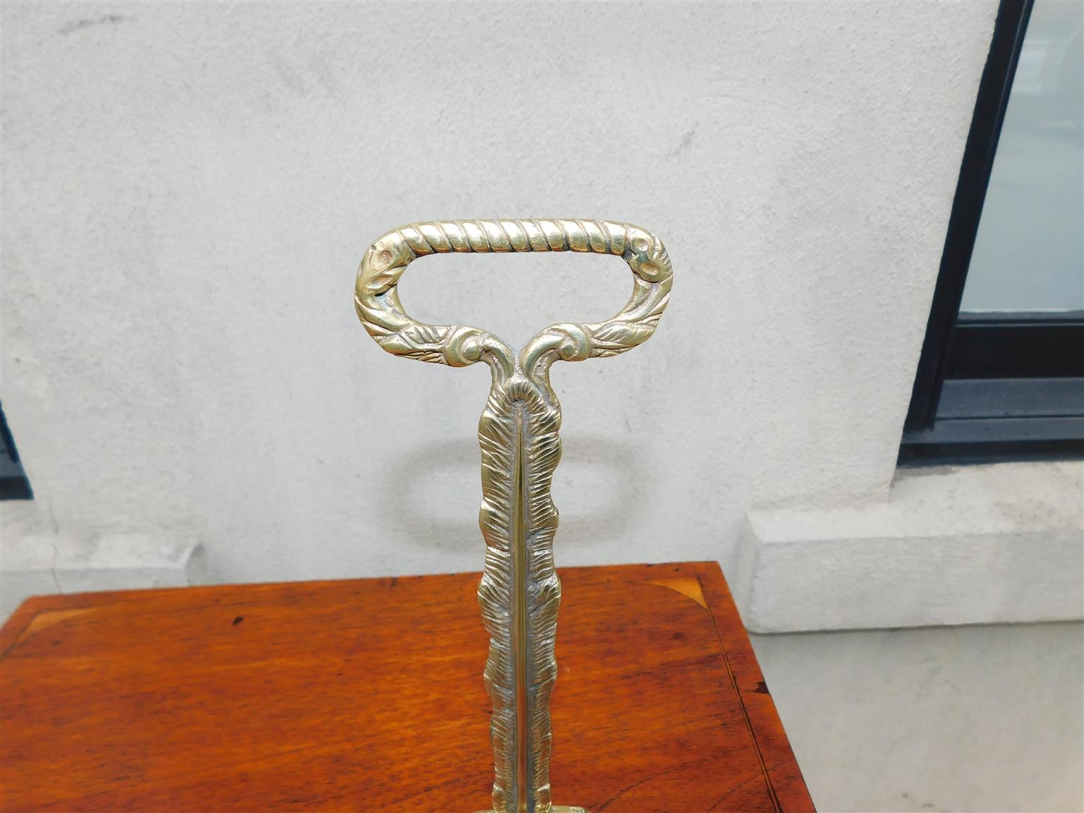Pair of English Chippendale Brass Lion Paw Doorstops with Oval Handles, C. 1780 For Sale 3