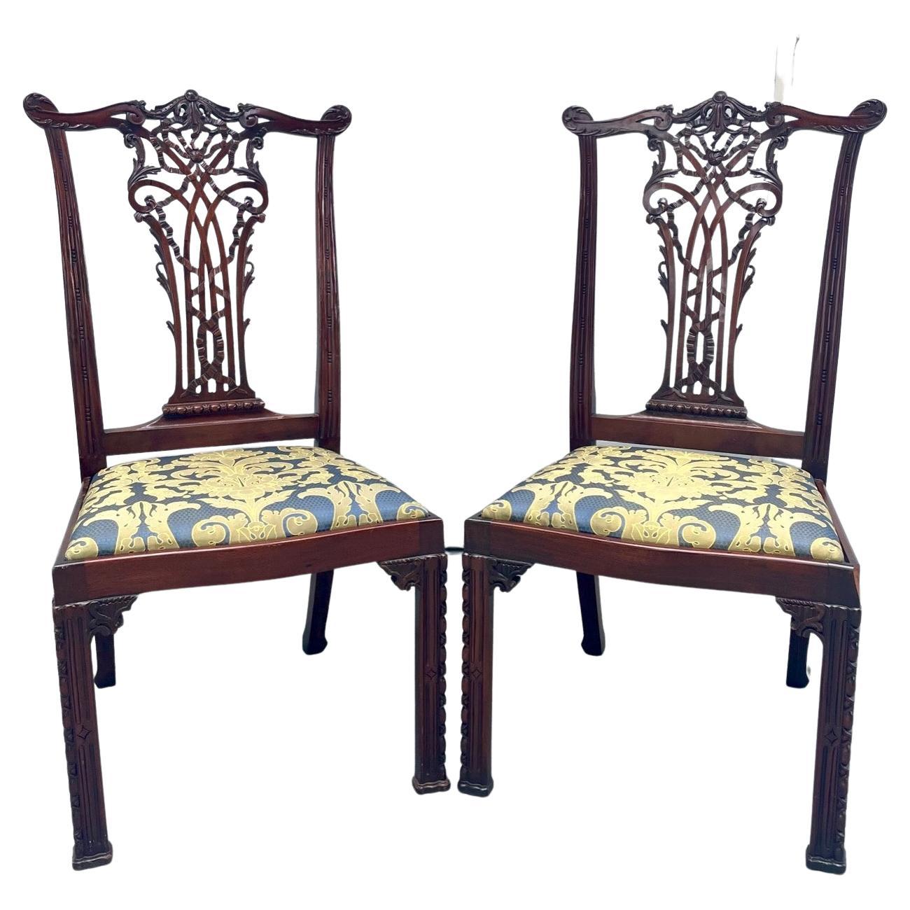 Pair of English Chippendale Mahogany side chairs, circa 1890.

Outstanding pair of marvelous carved mahogany side chairs in Classic Chippendale style. They are crafted after one of the greatest English furniture makers. A shaped top rail above the