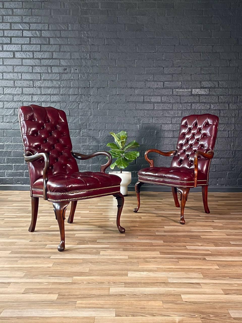American Pair of English Chippendale Style Button Tufted Leather Arm Chairs