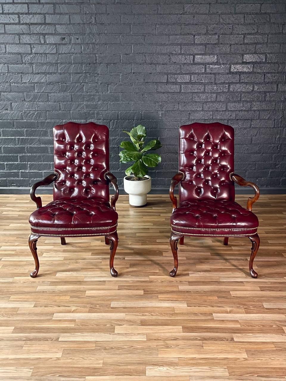 Mid-20th Century Pair of English Chippendale Style Button Tufted Leather Arm Chairs