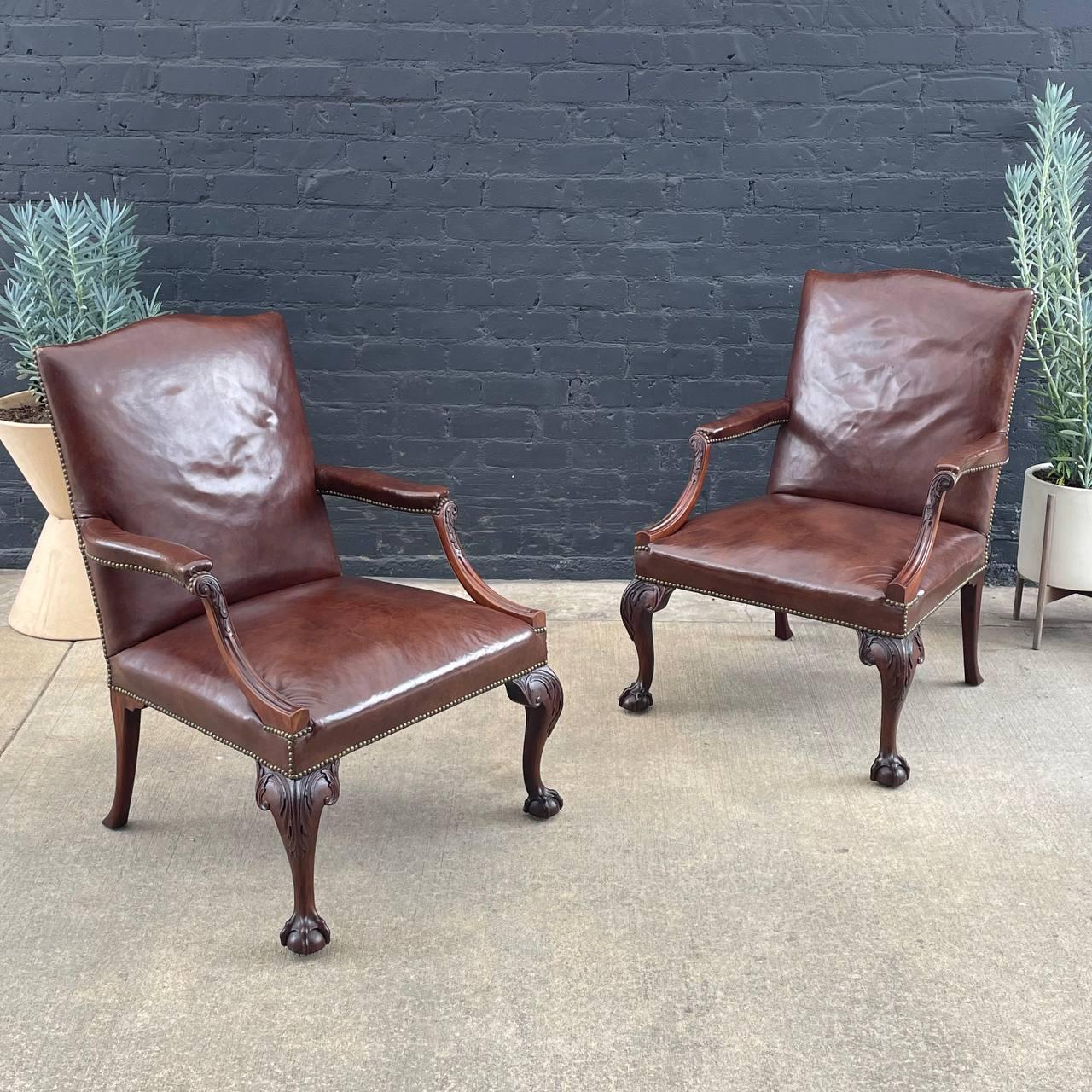 Pair of English Chippendale-Style Gainsborough Leather Arm Chairs 

Country: French
Materials: Carved Wood
Condition: Newly Upholstered
Style: French Louis XV
Year: 1940s

$3,500 pair 

Dimensions:
42.50”H x 29”W x 32”D
Seat Height 21“.