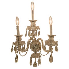 Pair of English cut crystal three light wall sconces with pendants