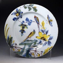 Pair of English Delftware Polychrome Decorated Chargers of Exceptional Quality