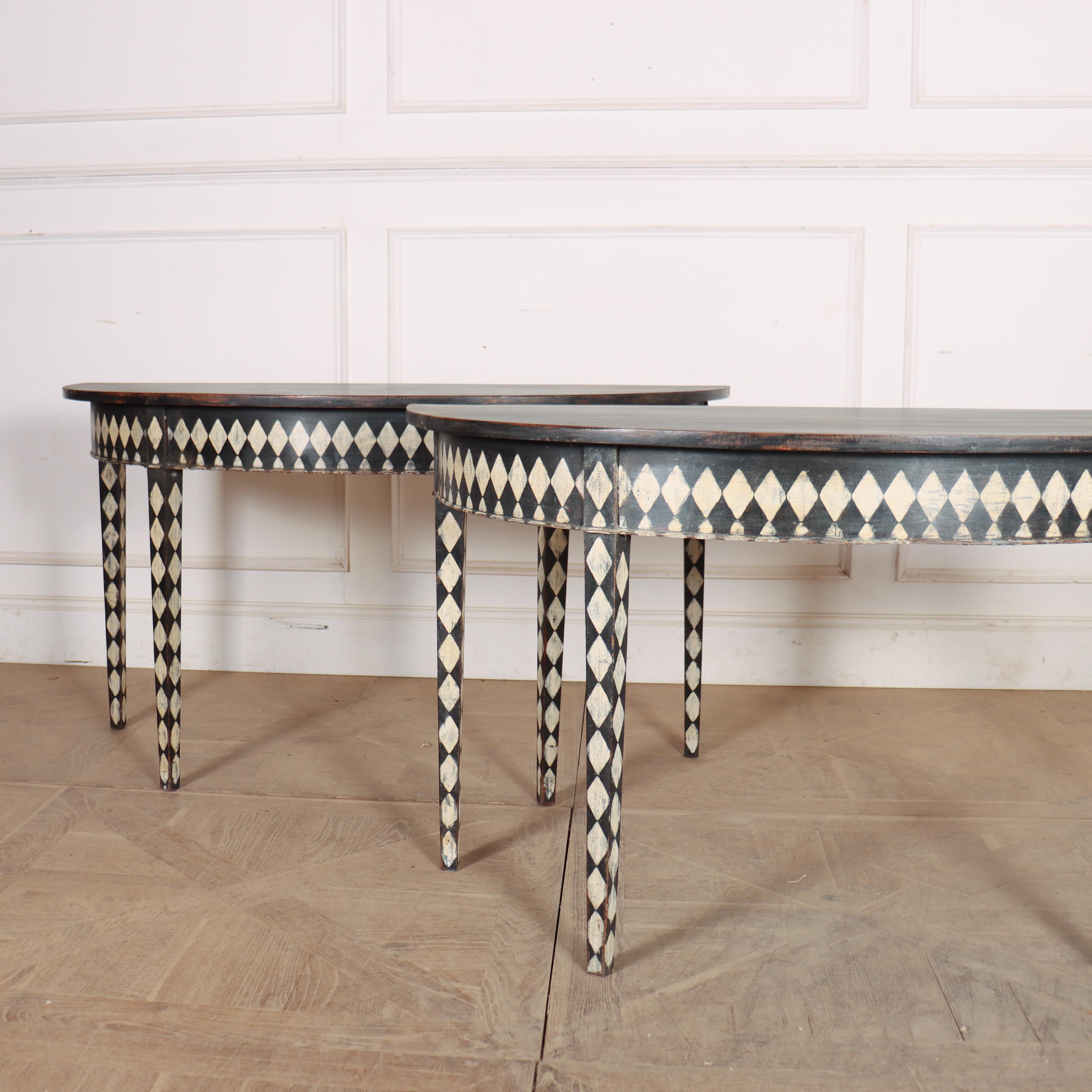 Pair of 19th century English oak demi-lune console tables with harlequin decoration. 1850. 

Clearance: 23-inches


Internal reference: H


Code: 9010

Dimensions:
W: 51