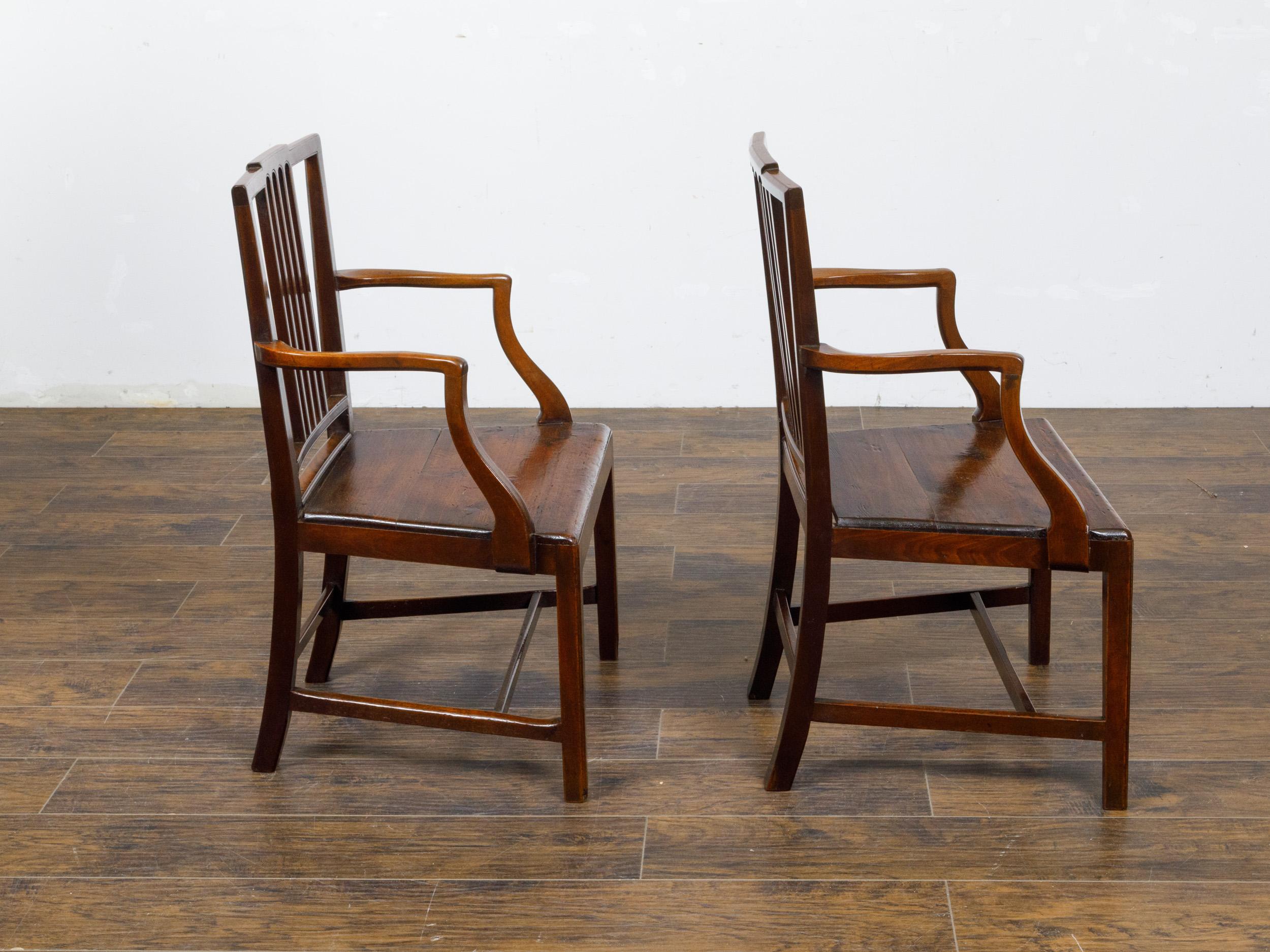 George III Pair of English Early 19th Century Plank Seat Chairs with Scrolling Arms For Sale
