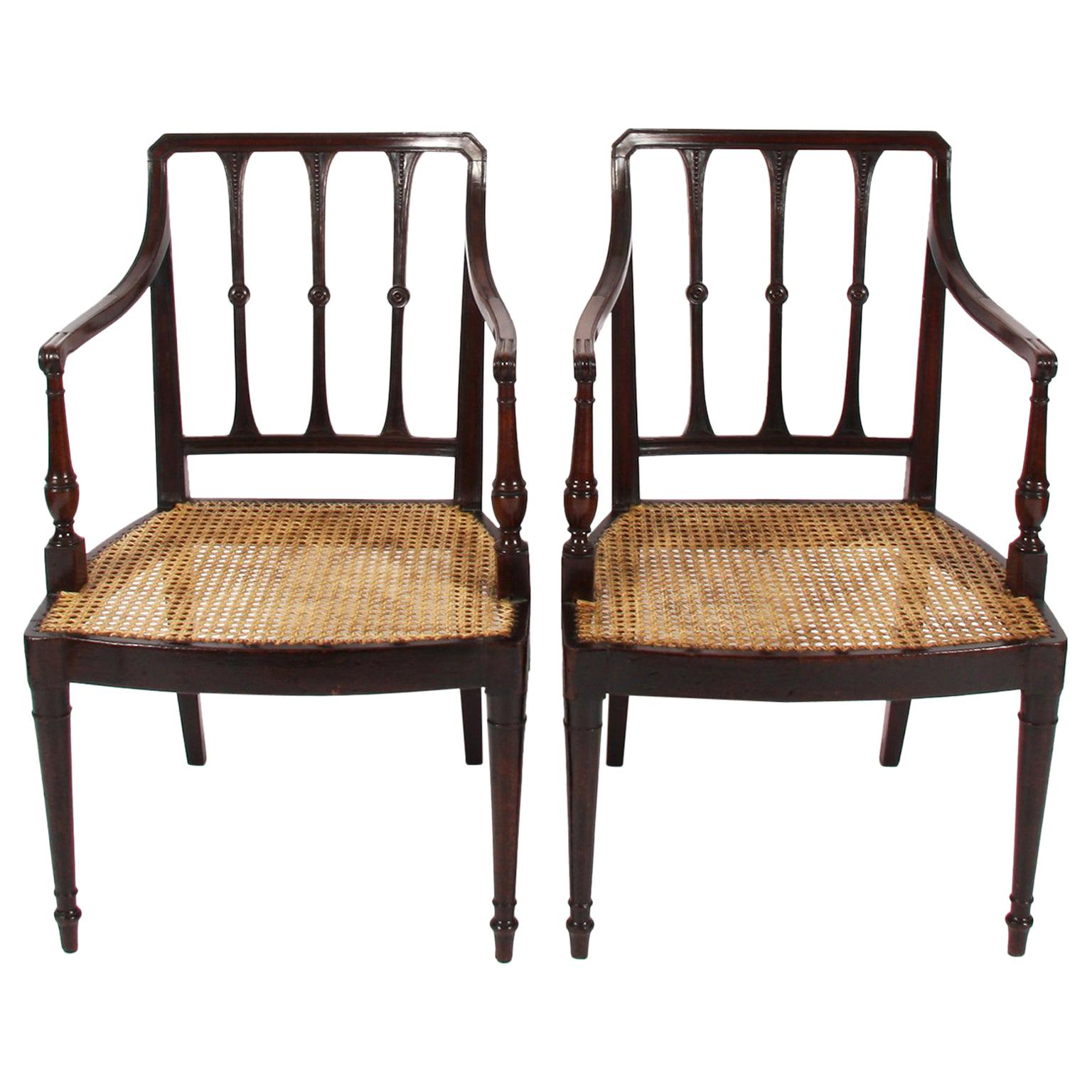 Pair of English Early 20th Century Caned Mahogany Chairs