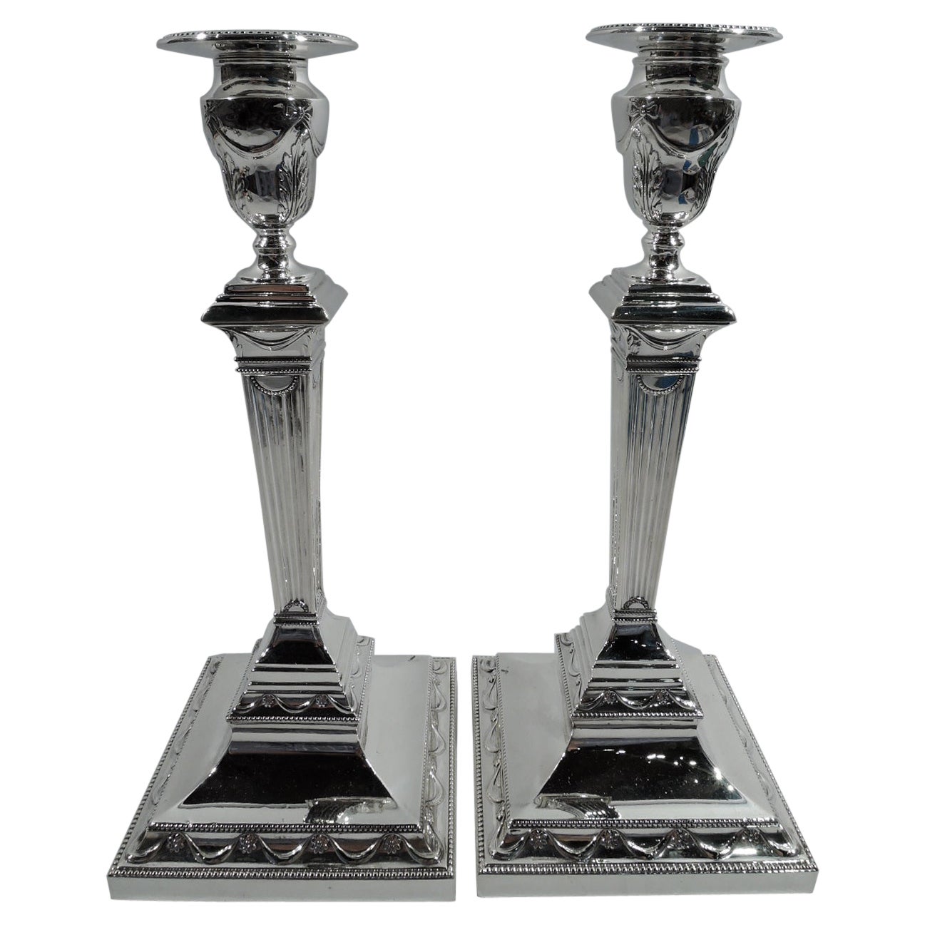 Pair of English Edwardian Neoclassical Sterling Silver Candlesticks