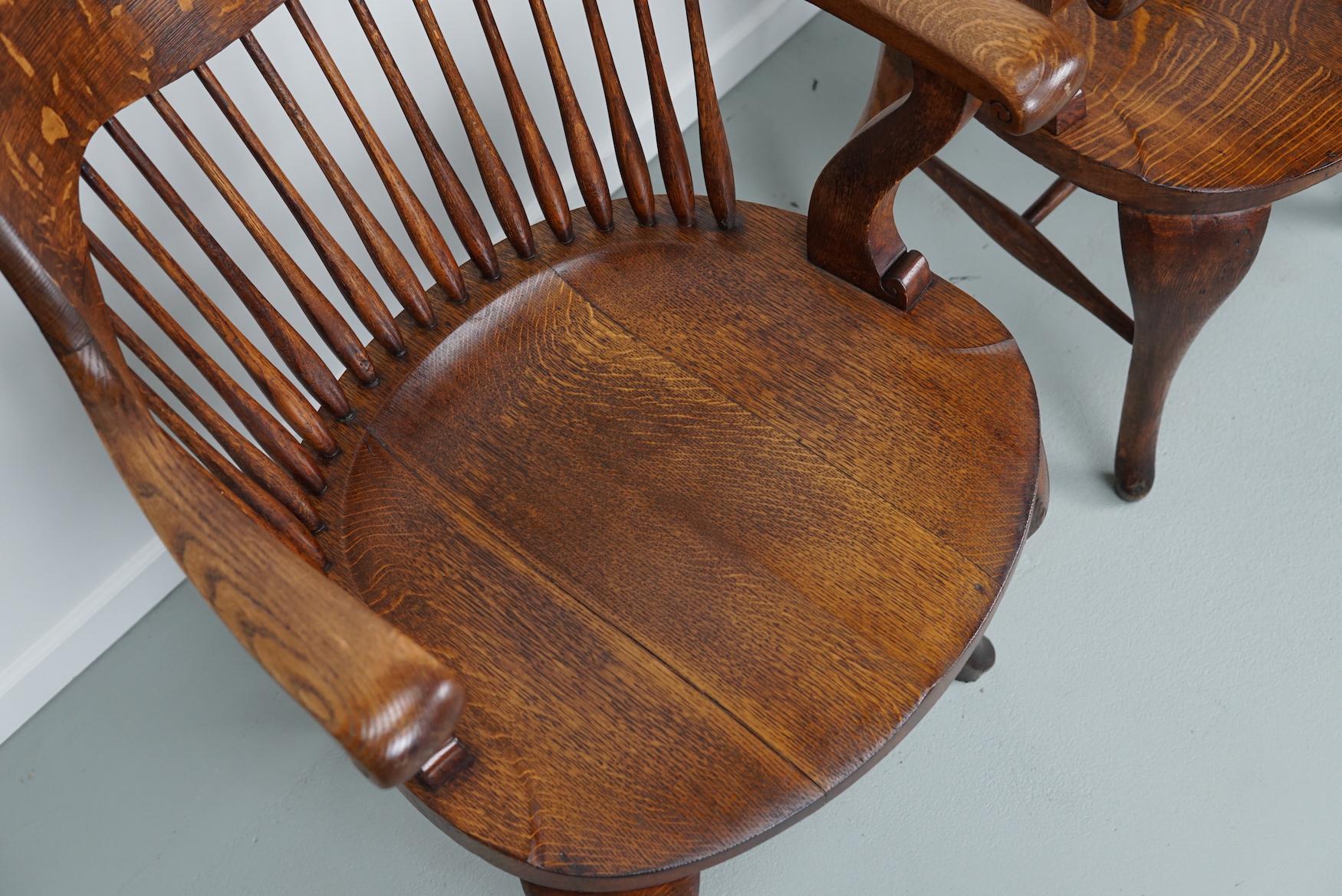 Pair of English Edwardian Oak Spindle Back Captains Office Desk Chairs For Sale 9